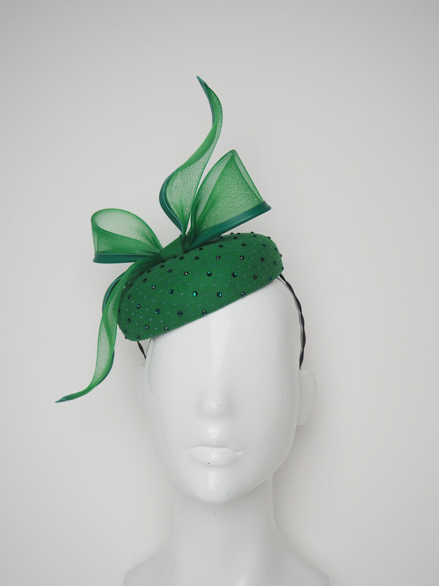 Emerald Envy - Emerald fine Fur felt button with crinoline bow and diamante veil detail.