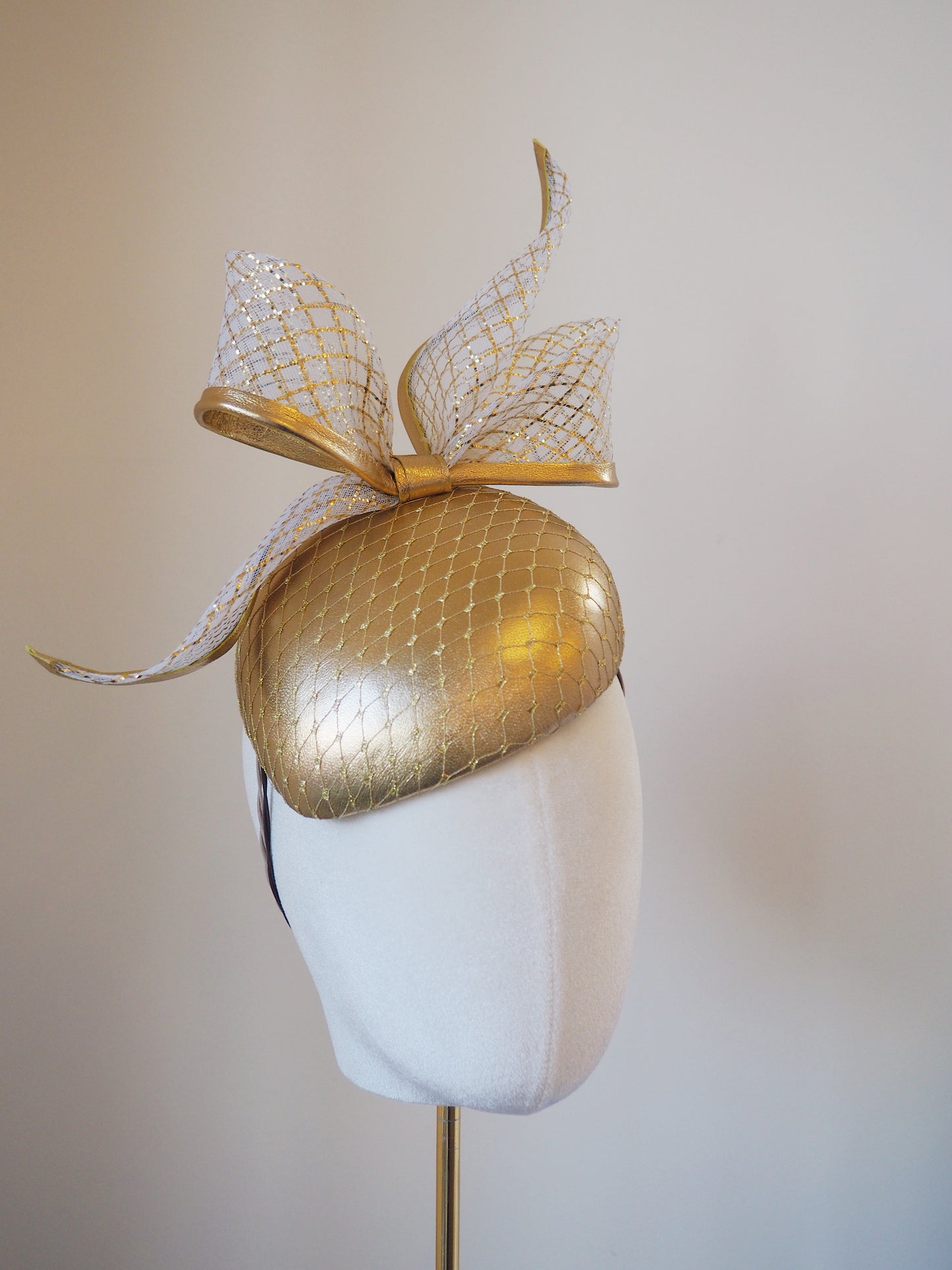 Golden Glow - Gold leather face hugger with white and gold lurex crinoline bow