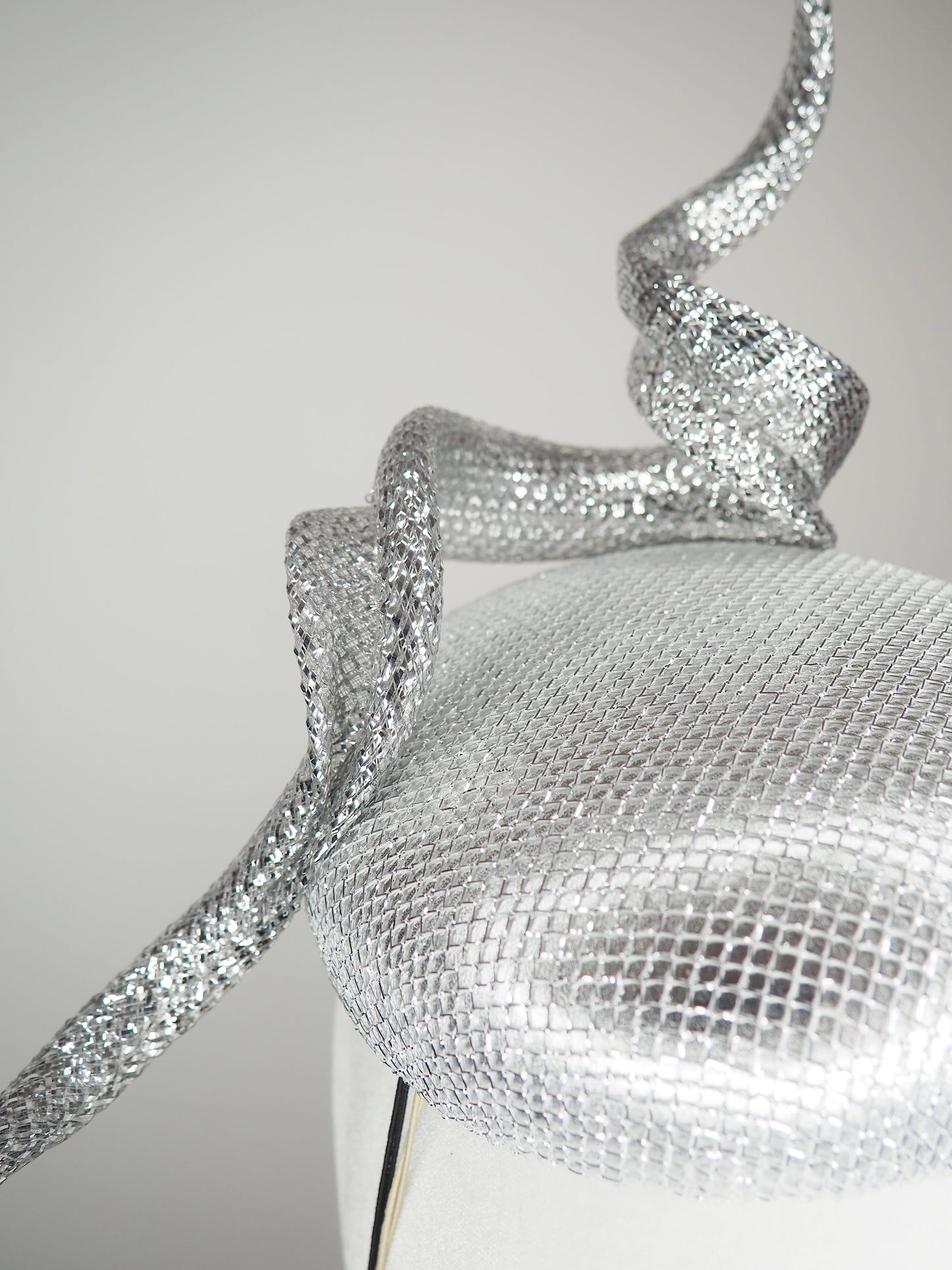 Lightning Strikes - Silver lurex and leather button with sculpted silver wired swirl