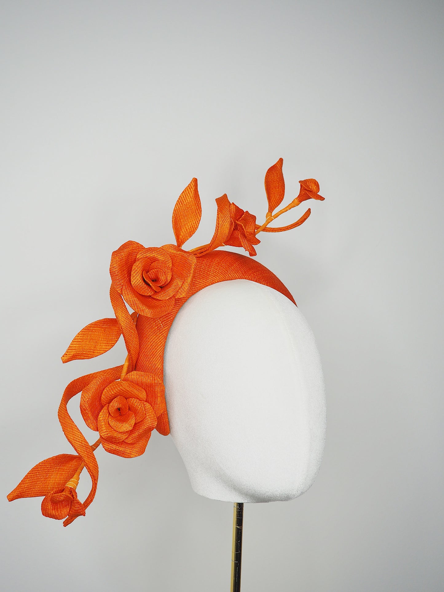 Tangerine Bloom - Orange 3D headband in Tinalak straw with sculptural orange swirl and hand-sculpted orange straw roses and buds