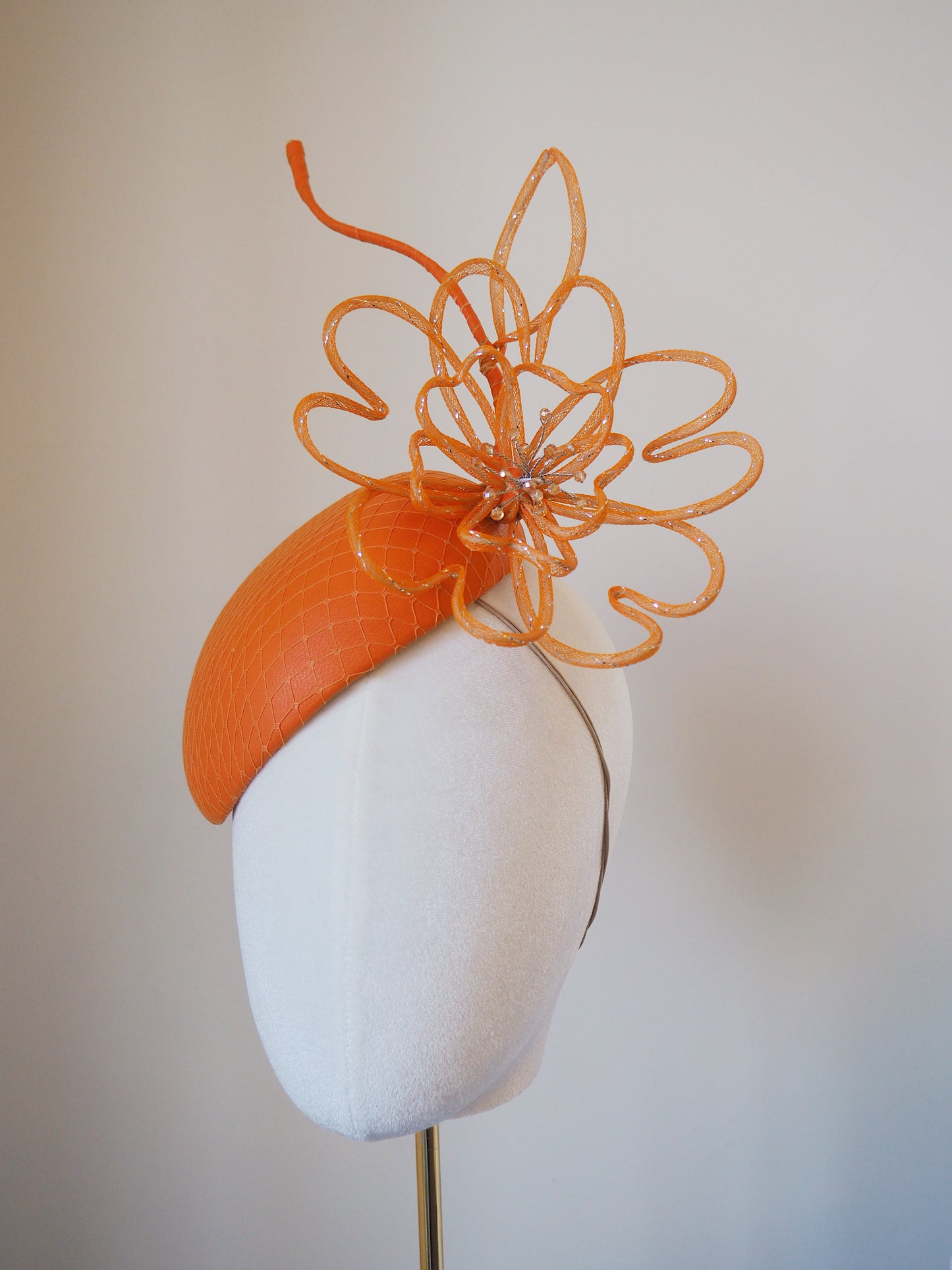 Orange Burst - Orange leather petite face hugger beret with wired crinoline flower