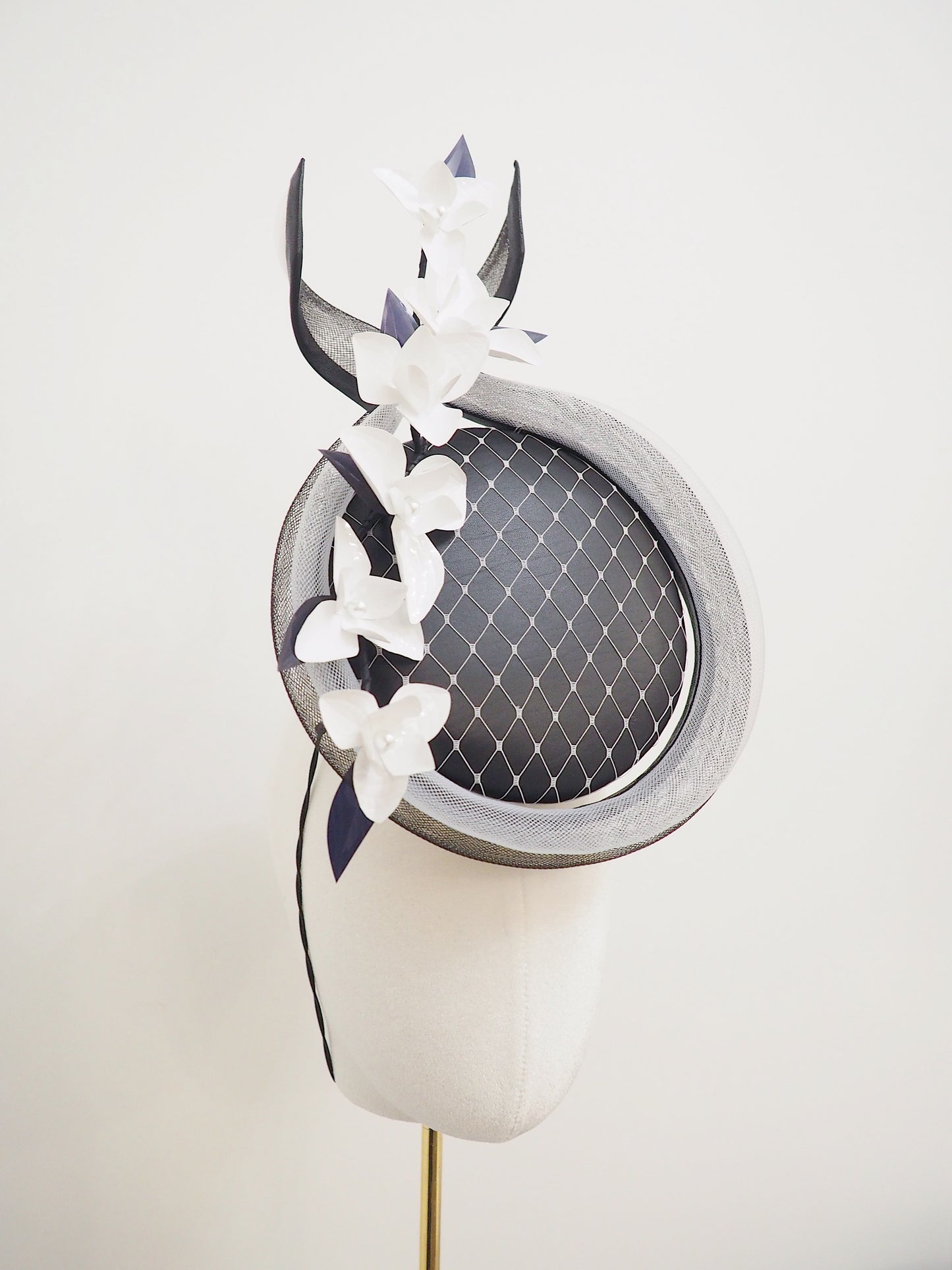 Ying and Yang - Black and white leather percher with crinoline wire detail and flower bud vine
