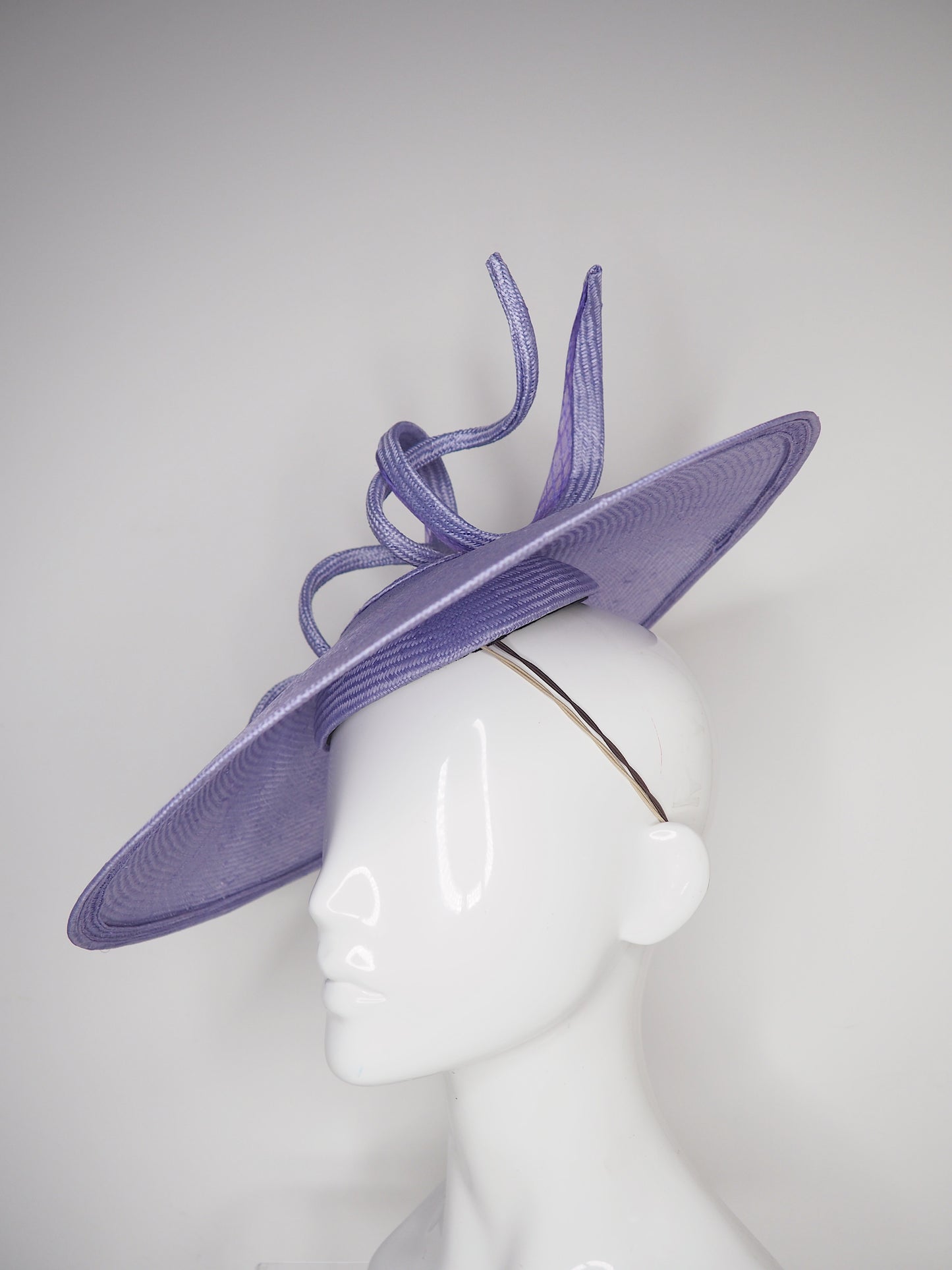 Lilac Loop - lilac hand dyed straw brim coolie with a crinoline edged straw swirl and wired straw loop.
