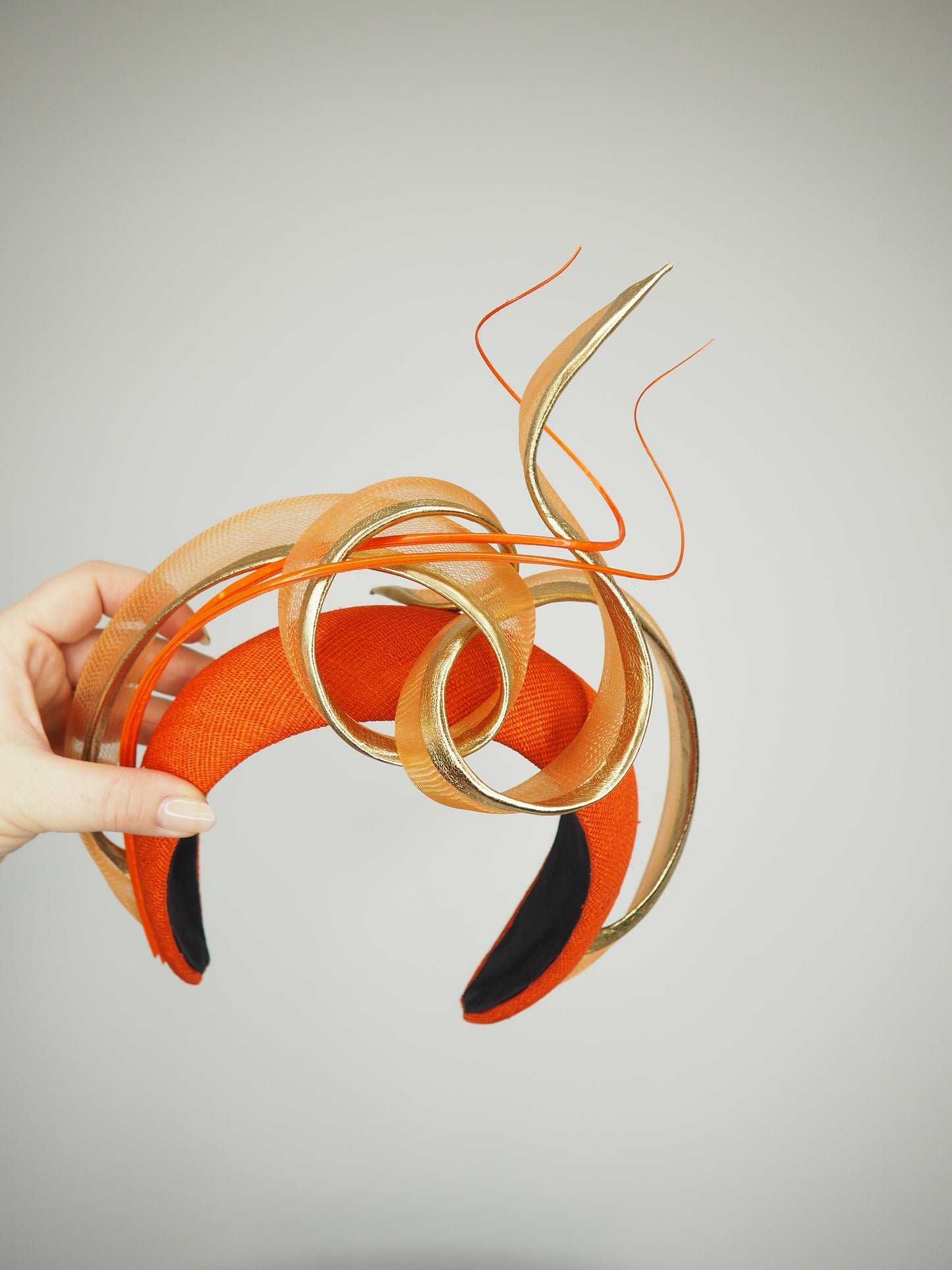 Golden Nova - Orange tinalak straw headband with golden leather edged crinoline swirl
