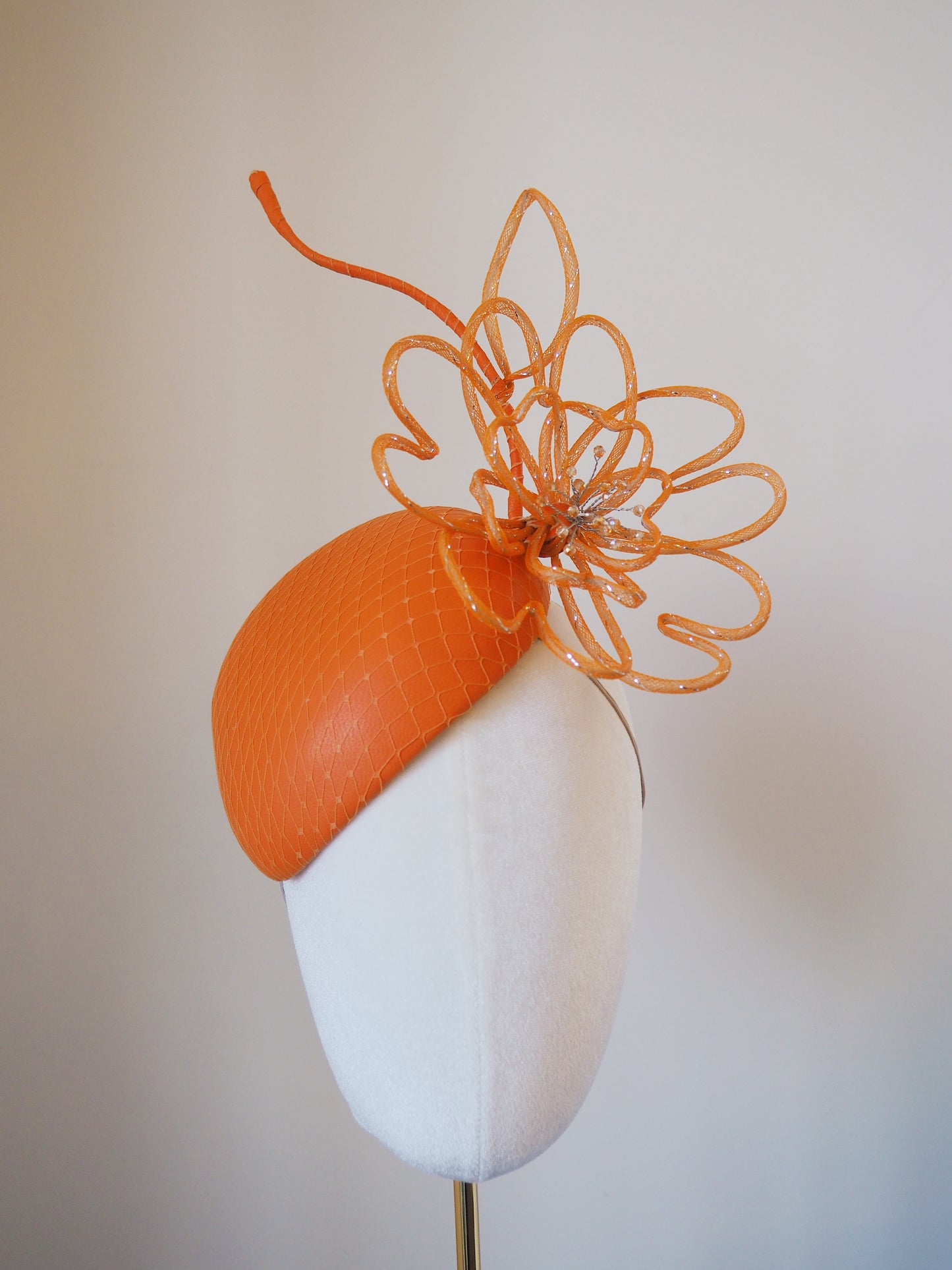 Orange Burst - Orange leather petite face hugger beret with wired crinoline flower