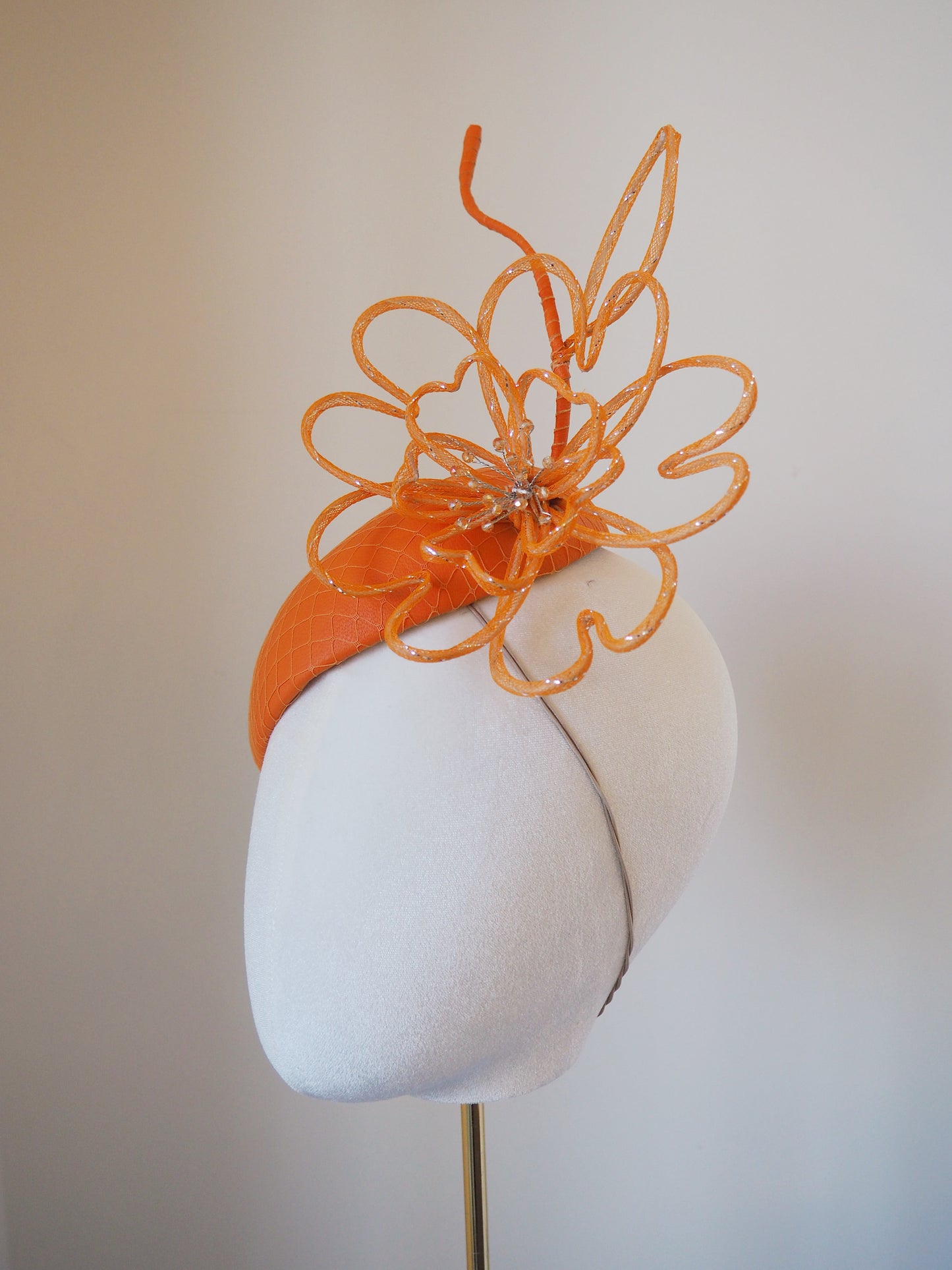 Orange Burst - Orange leather petite face hugger beret with wired crinoline flower
