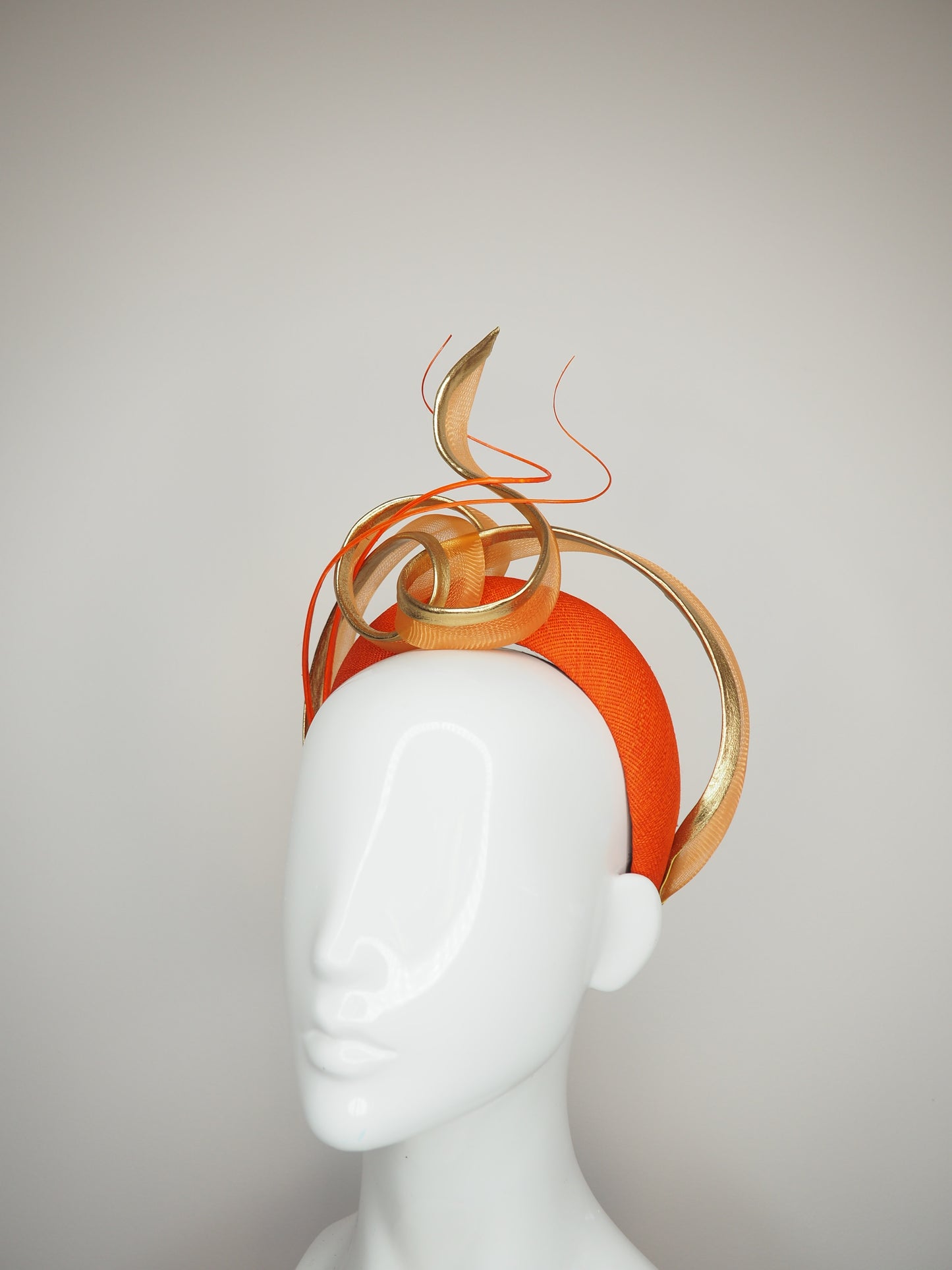 Golden Nova - Orange tinalak straw headband with golden leather edged crinoline swirl