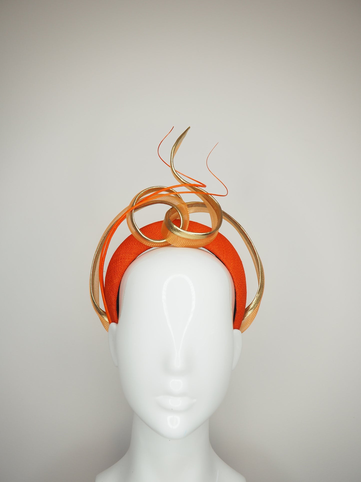 Golden Nova - Orange tinalak straw headband with golden leather edged crinoline swirl