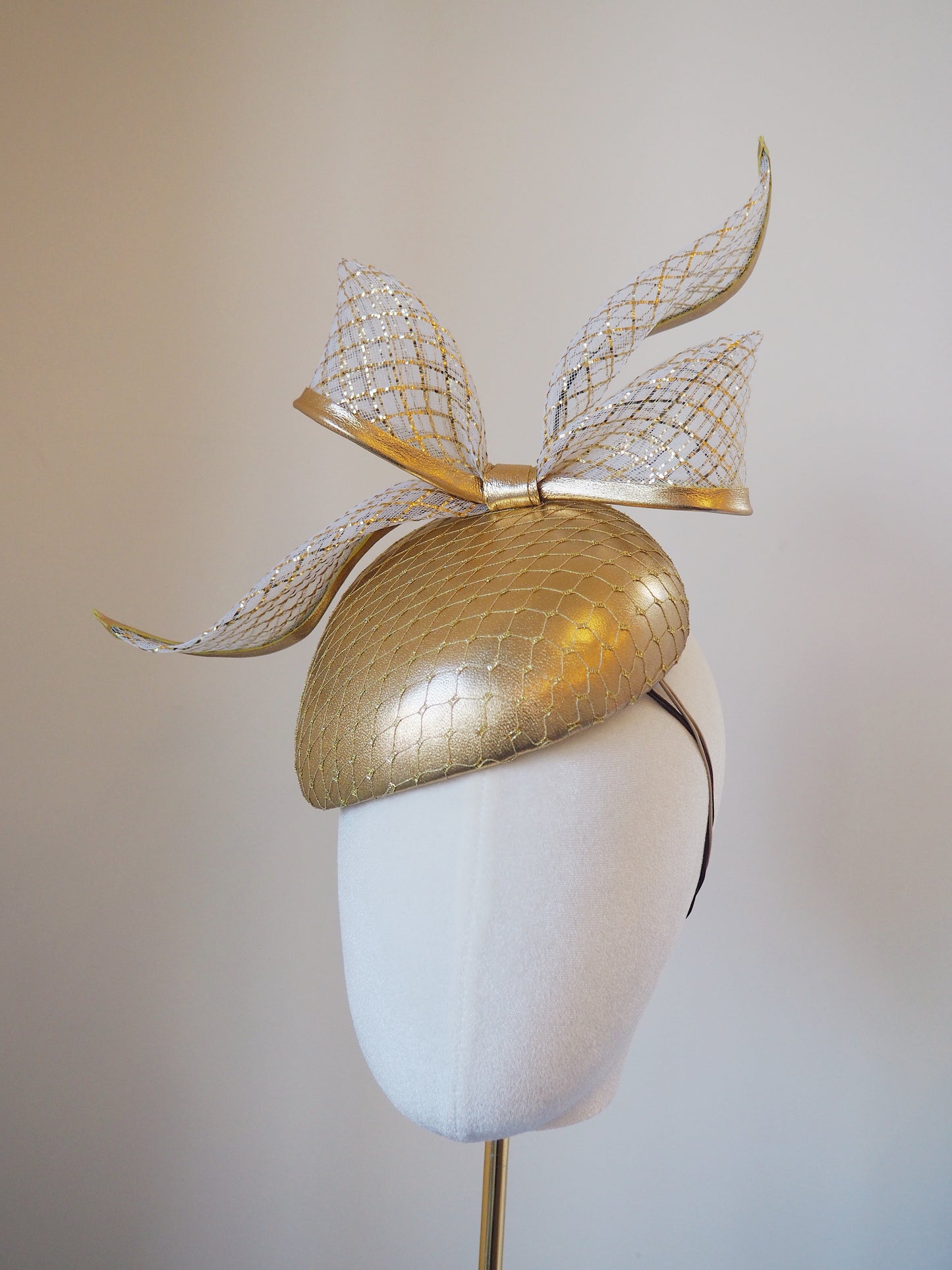 Golden Glow - Gold leather face hugger with white and gold lurex crinoline bow