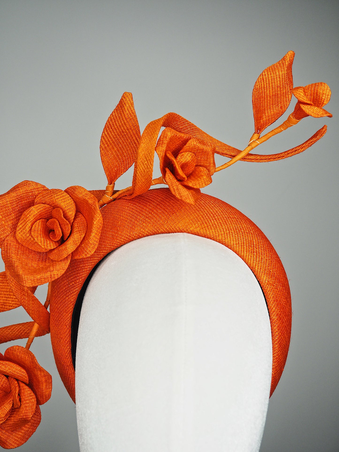 Tangerine Bloom - Orange 3D headband in Tinalak straw with sculptural orange swirl and hand-sculpted orange straw roses and buds