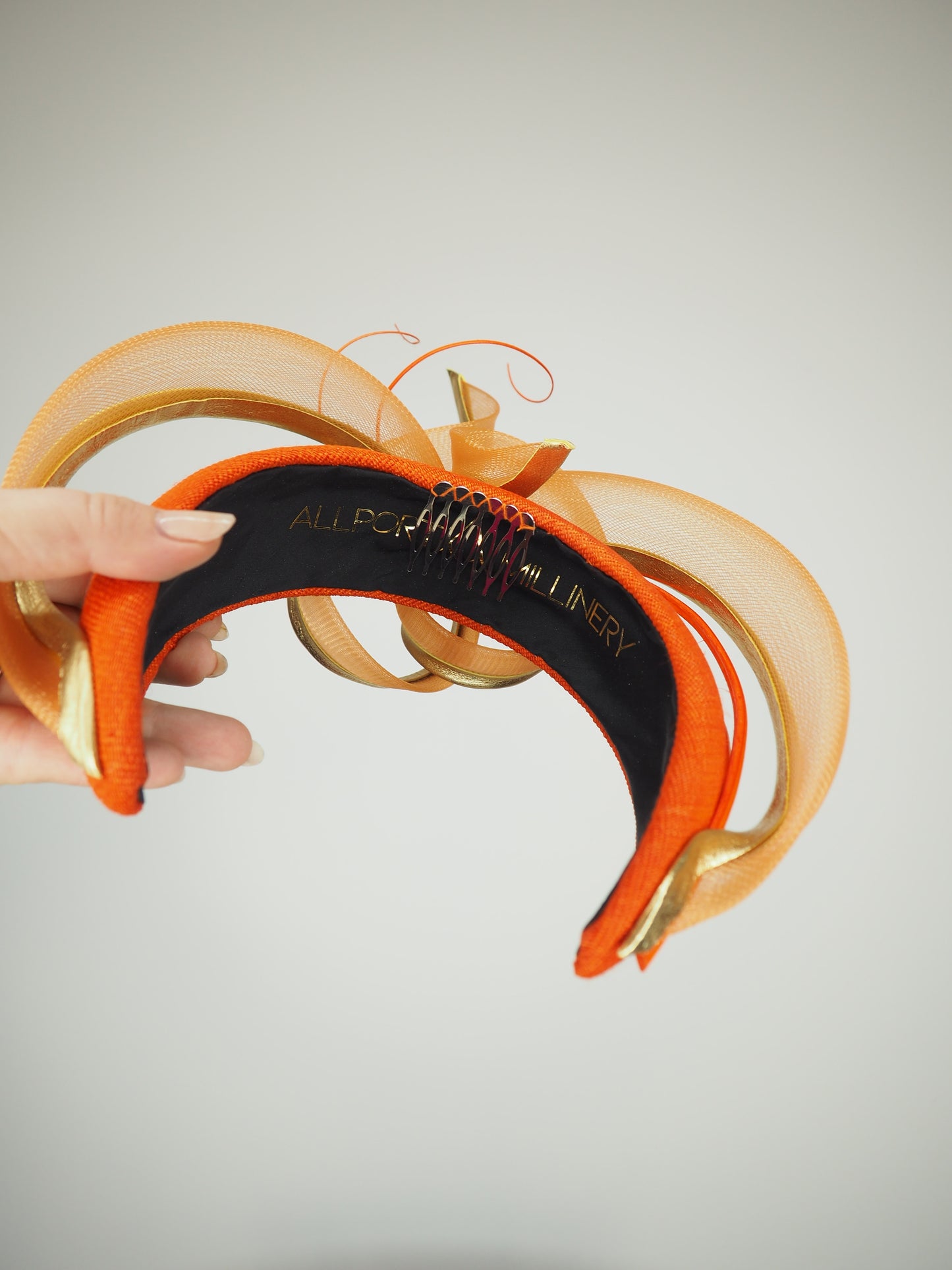 Golden Nova - Orange tinalak straw headband with golden leather edged crinoline swirl