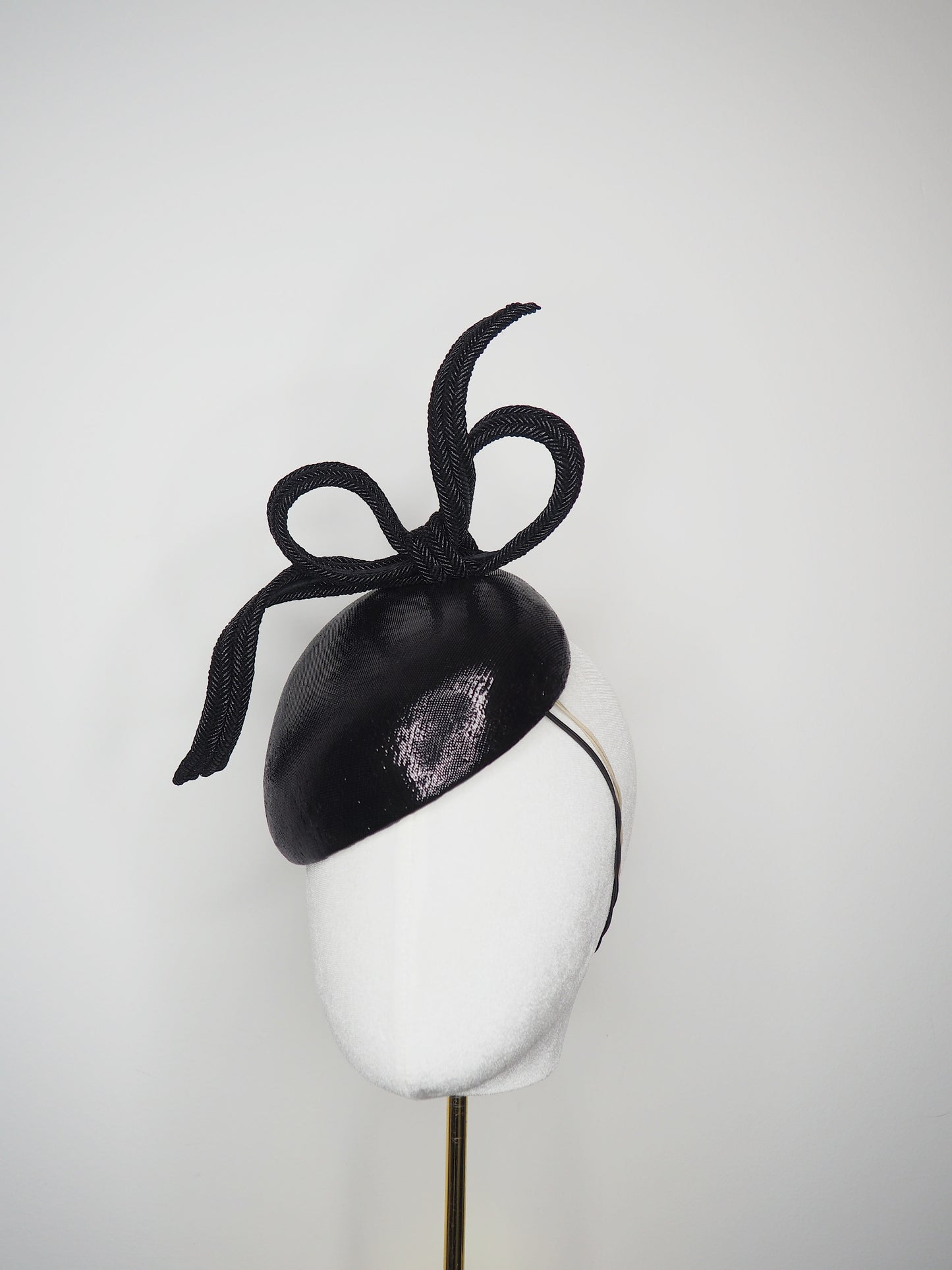 Baby Bow - Wired braid bow on a luxurious black fabric petite teardrop base