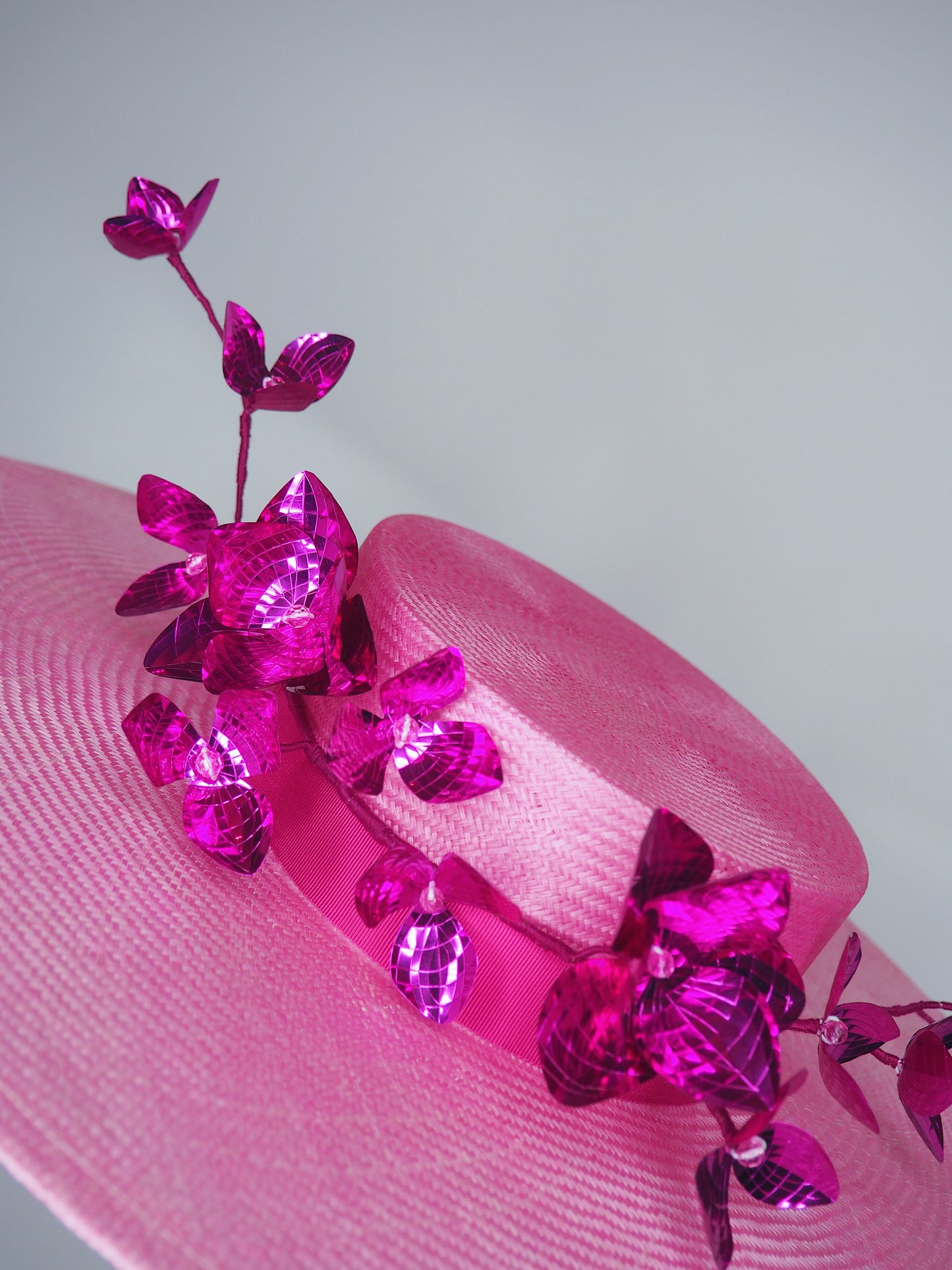 Shades of pink - Wide brimmed boater with shallow crown and magenta blossom vine
