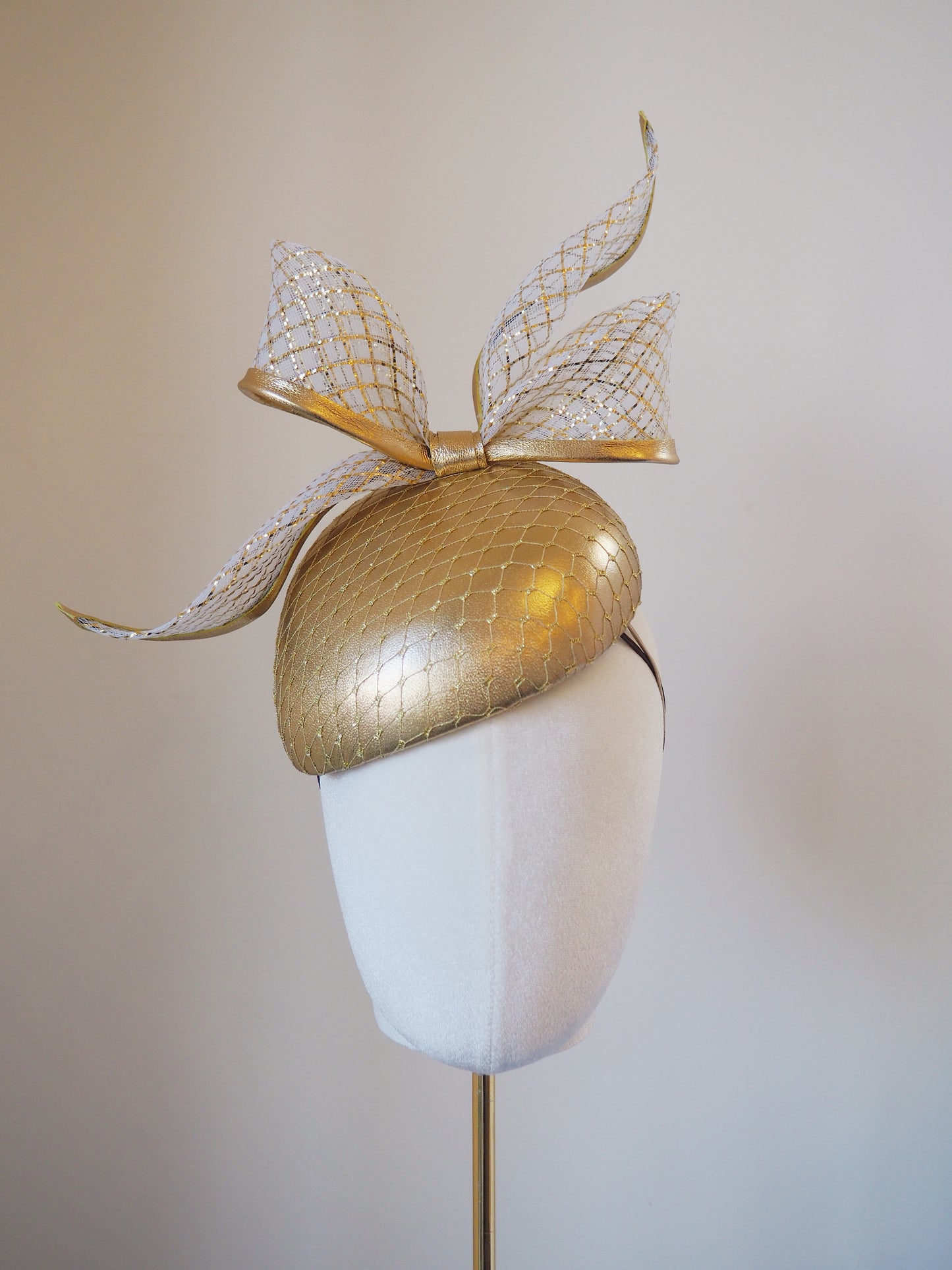 Golden Glow - Gold leather face hugger with white and gold lurex crinoline bow