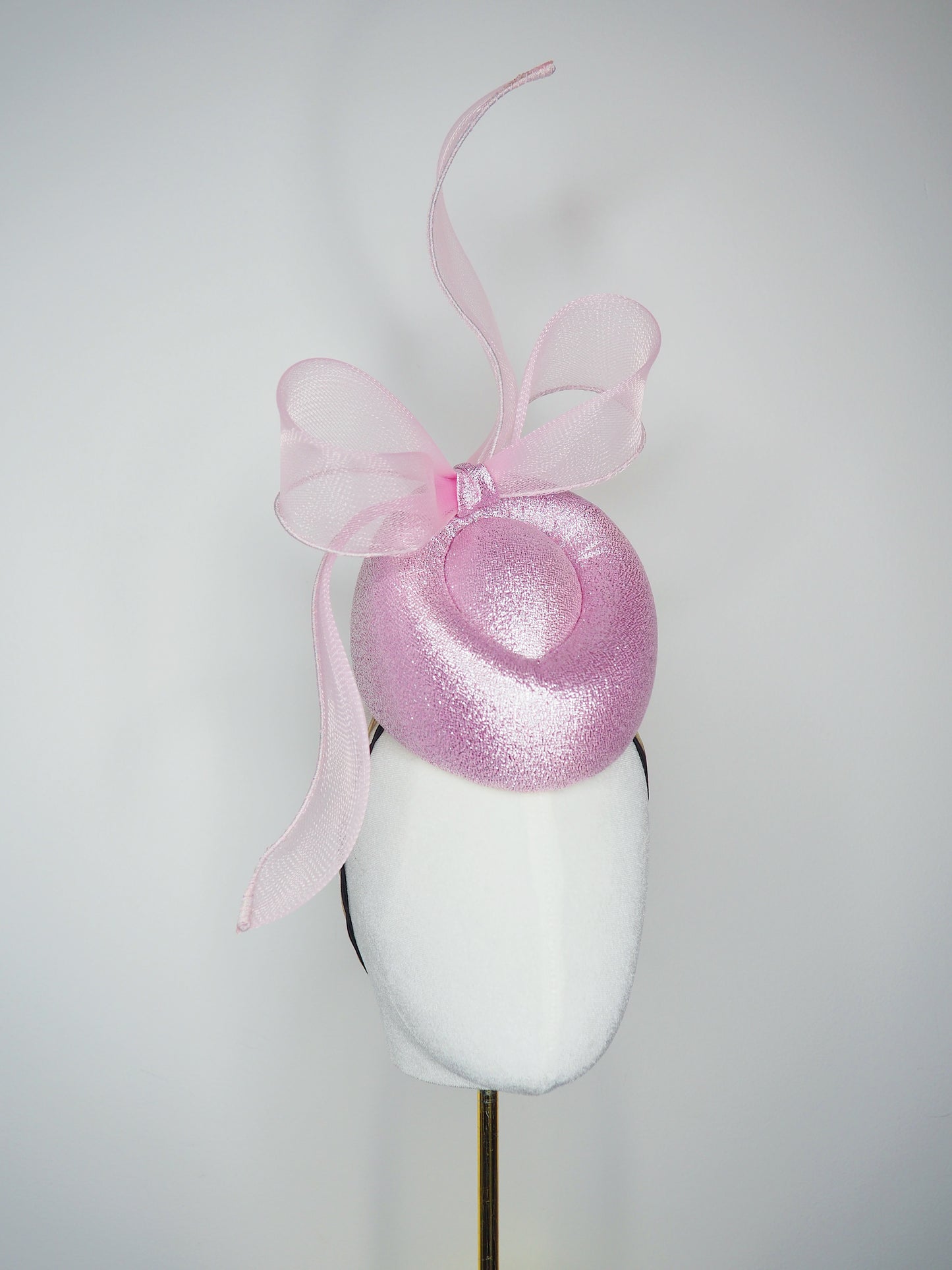 Pastel Polly - Windswept pink metallic fabric pork pie pillbox with a windswept crinoline bow