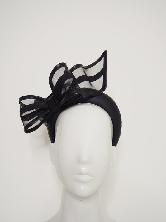 Windswept Bow - Black leather 3d headband with windswept crinoline wired bow.
