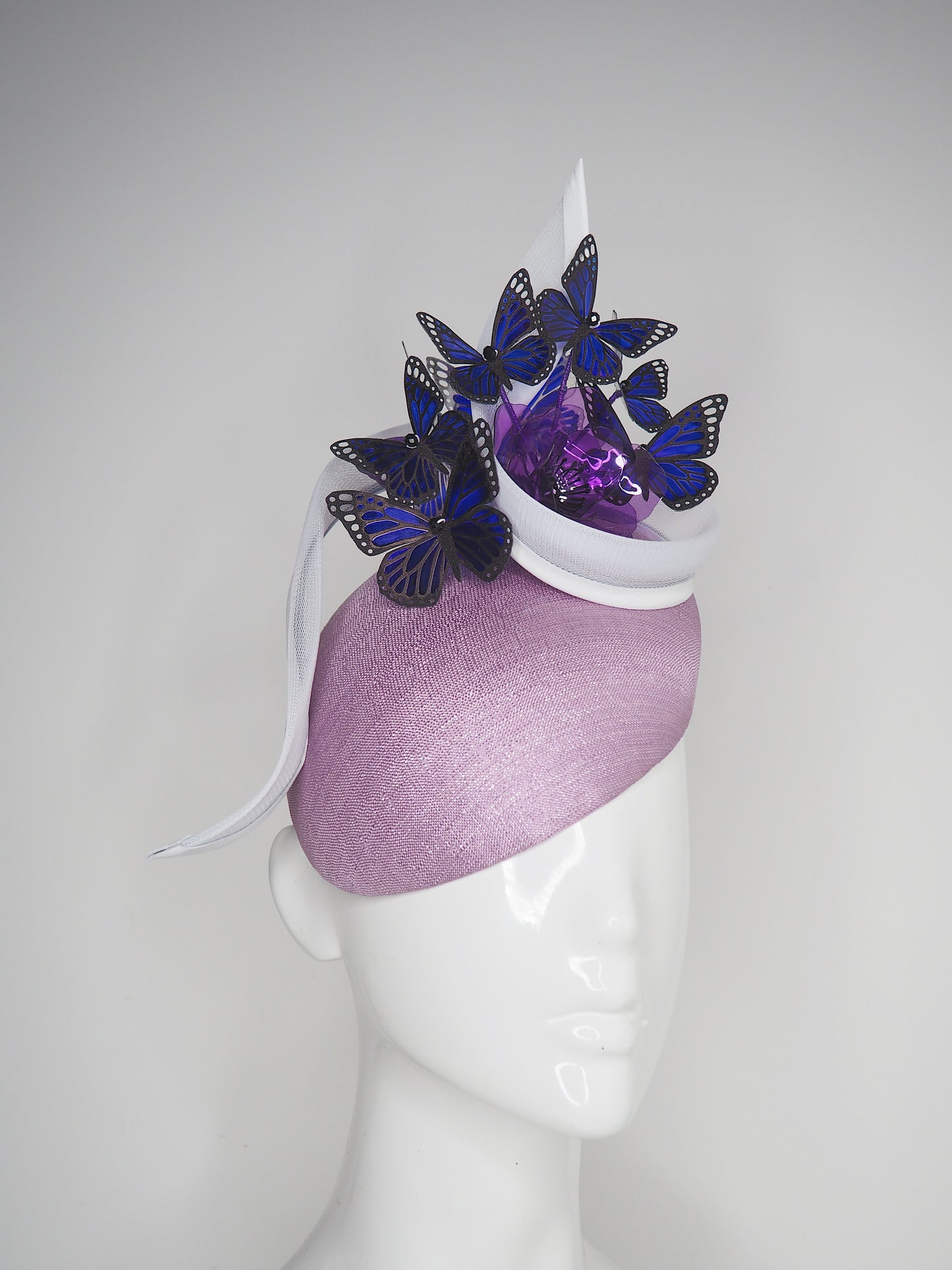 Butterfly Bloom - Hand painted indigo butterflies on a facehugger base with a purple crystoform bloom