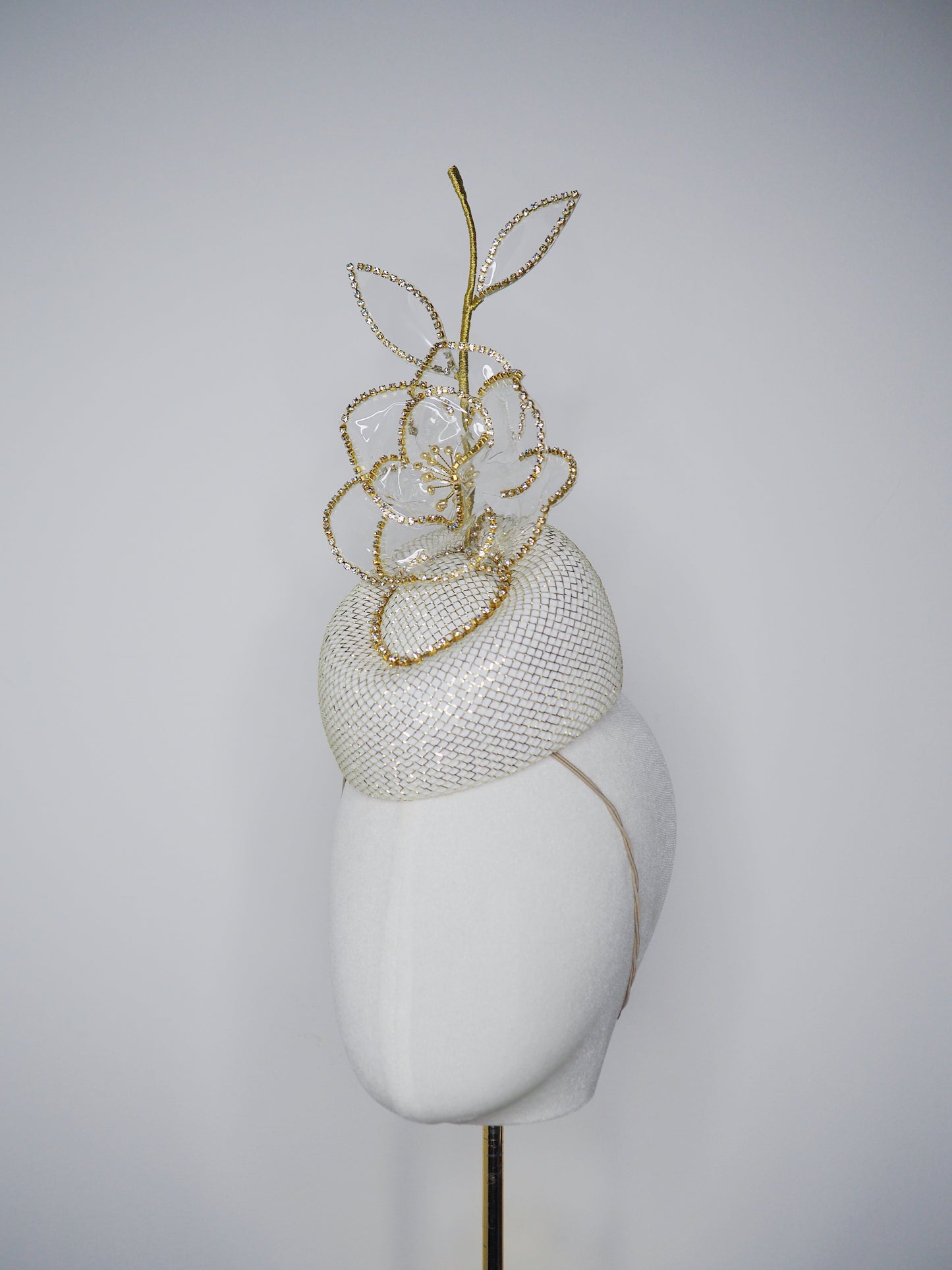 Golden Hour Rose - Pale gold lurex pork pie pillbox with gold diamante chain detail and a diamante encrusted crystoform rose