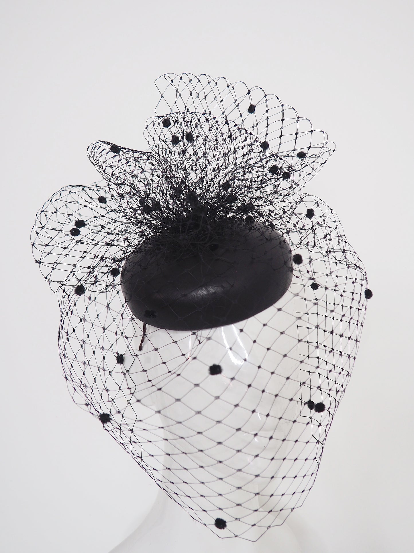 Under the veil - Full face spotty veil on leather button base