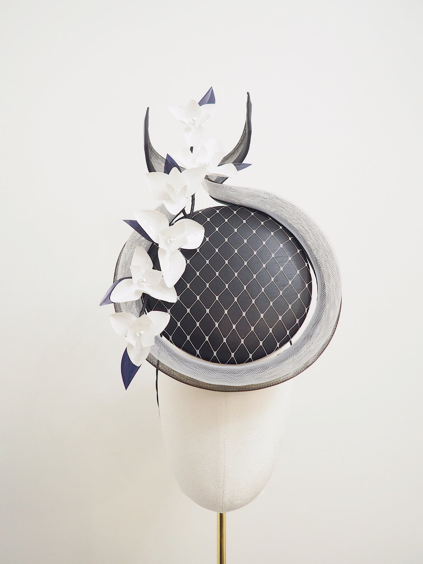 Ying and Yang - Black and white leather percher with crinoline wire detail and flower bud vine