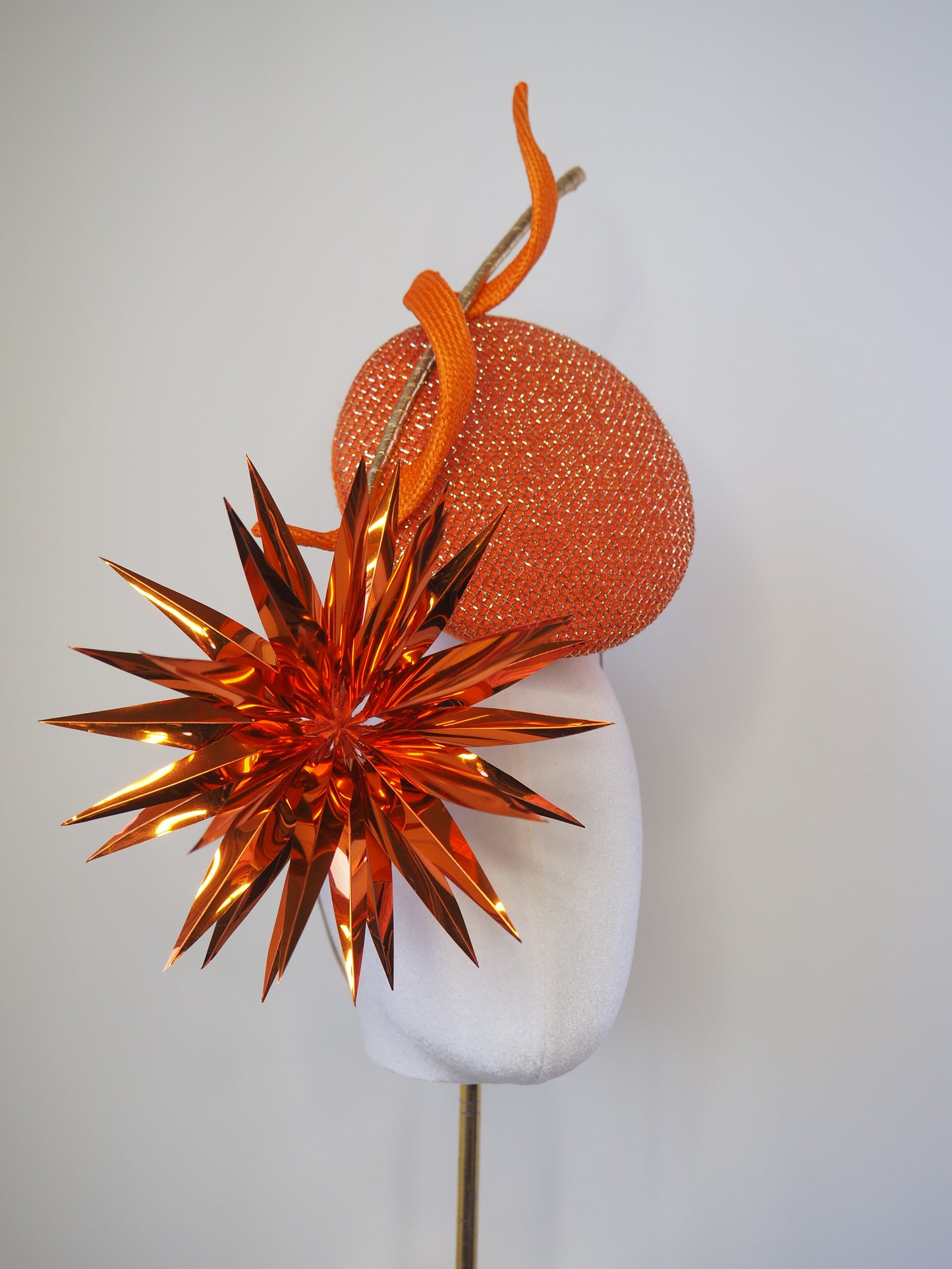 Solar Spark - Round gold and orange percher with orange sequin film starburst and gold quill detail