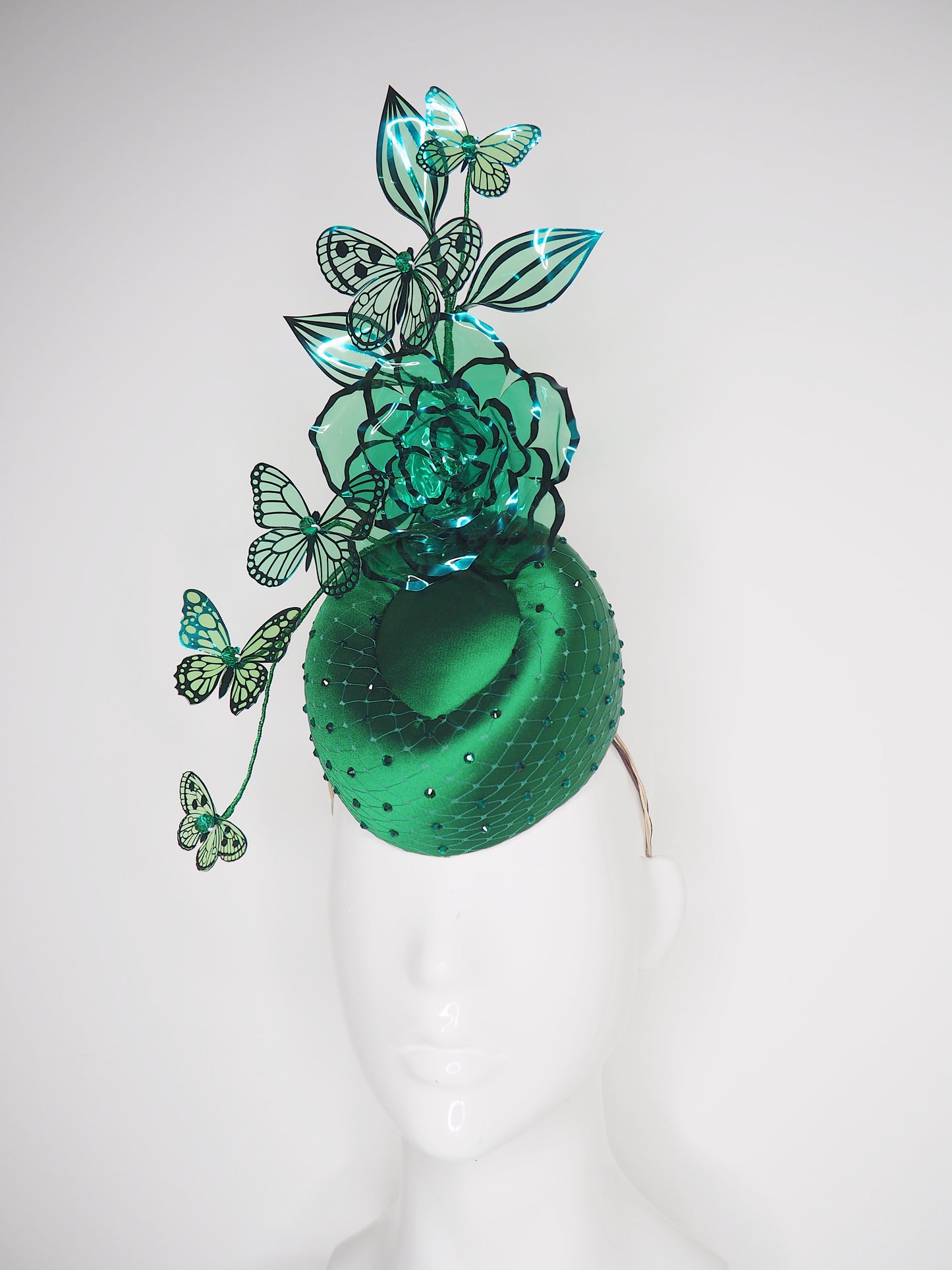 Butterfly Effect - Emerald Green satin embellished pork pie percher with butterflies and rose.