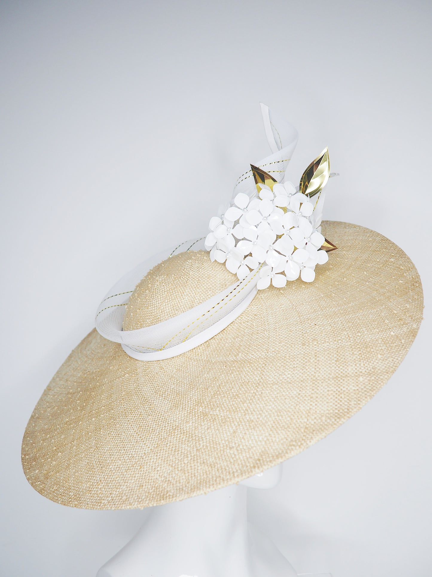 Natural Elegance - Natural knotted straw sloped brim with white hydrangea and gold lurex crinoline straw swirl
