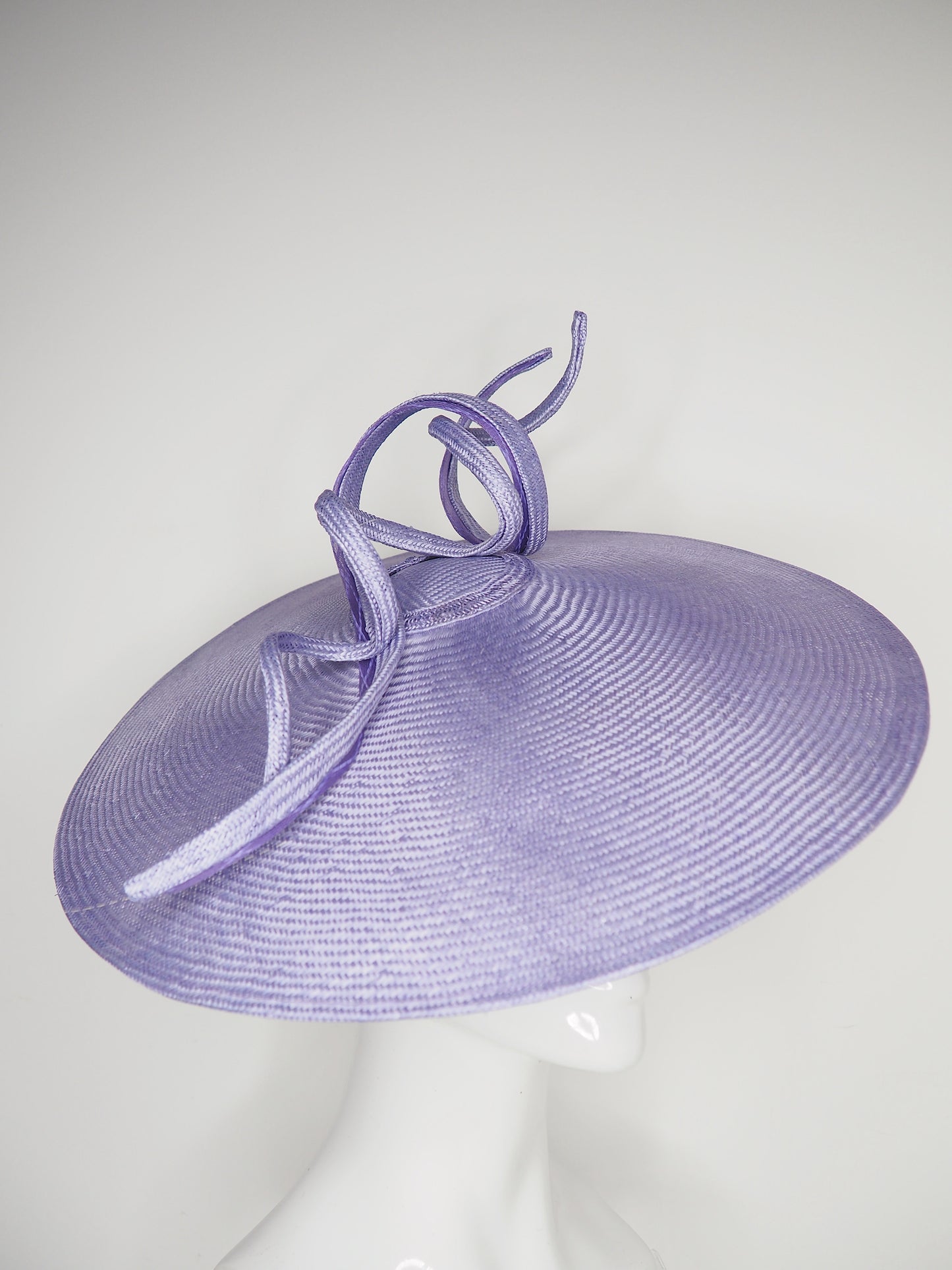 Lilac Loop - lilac hand dyed straw brim coolie with a crinoline edged straw swirl and wired straw loop.