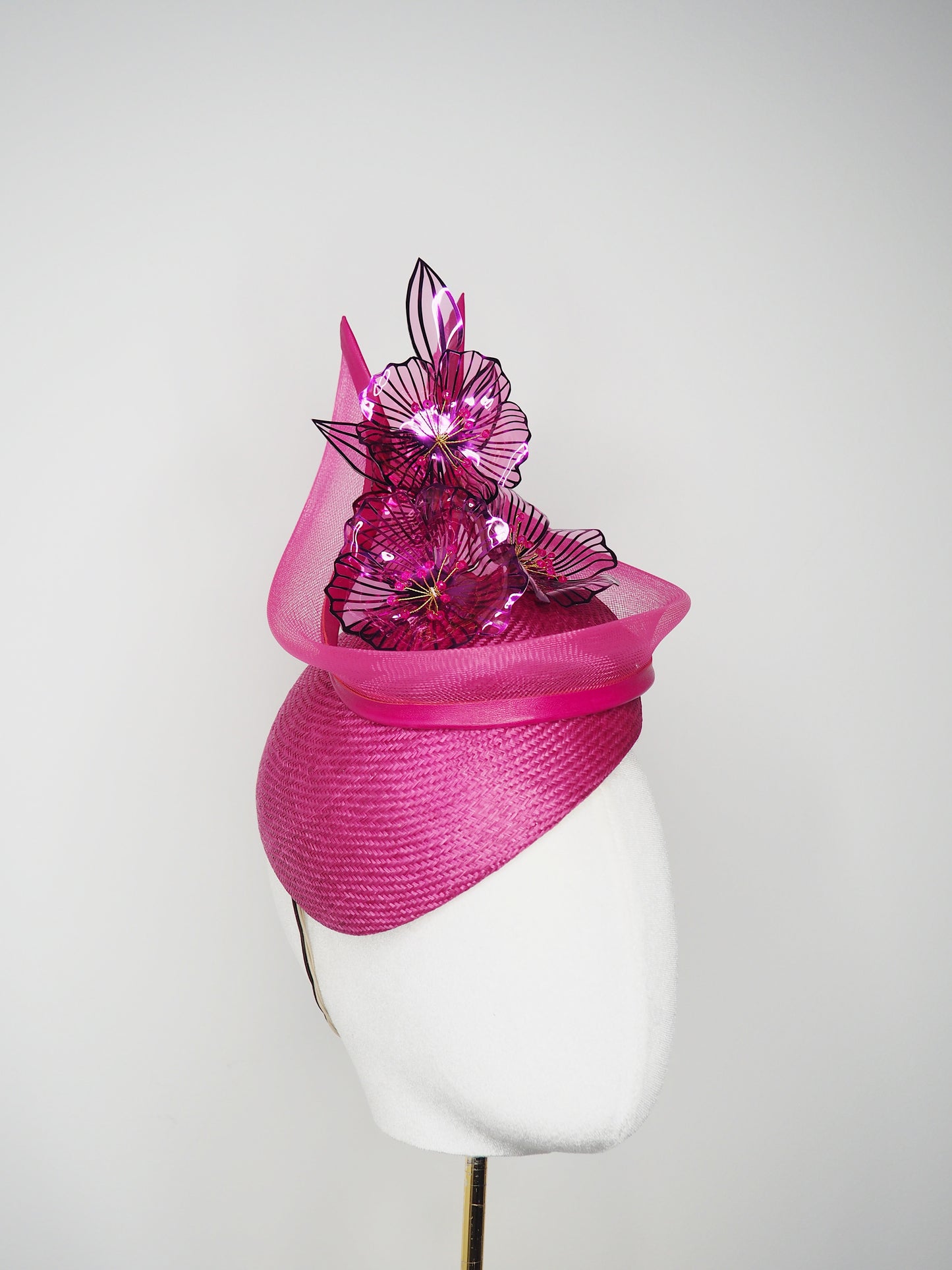 Berry Burst -Magenta hand-dyed straw facehugger base with magenta metallic edged crystoform flowers and magenta crinoline swirl