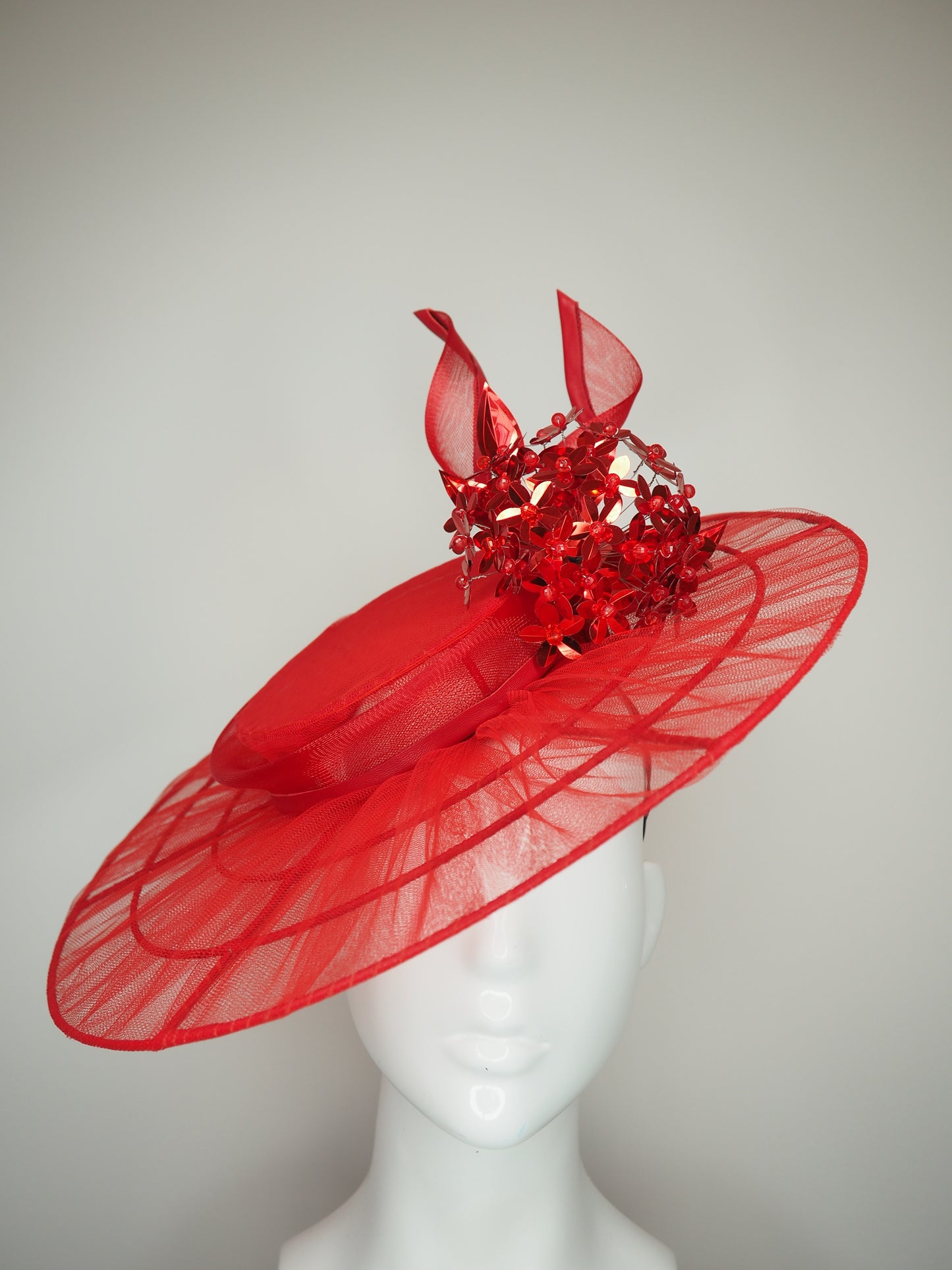 Crimson dust - Red Tulle wire brimmed boater with red leather edged crinoline swirl and beaded allium flower