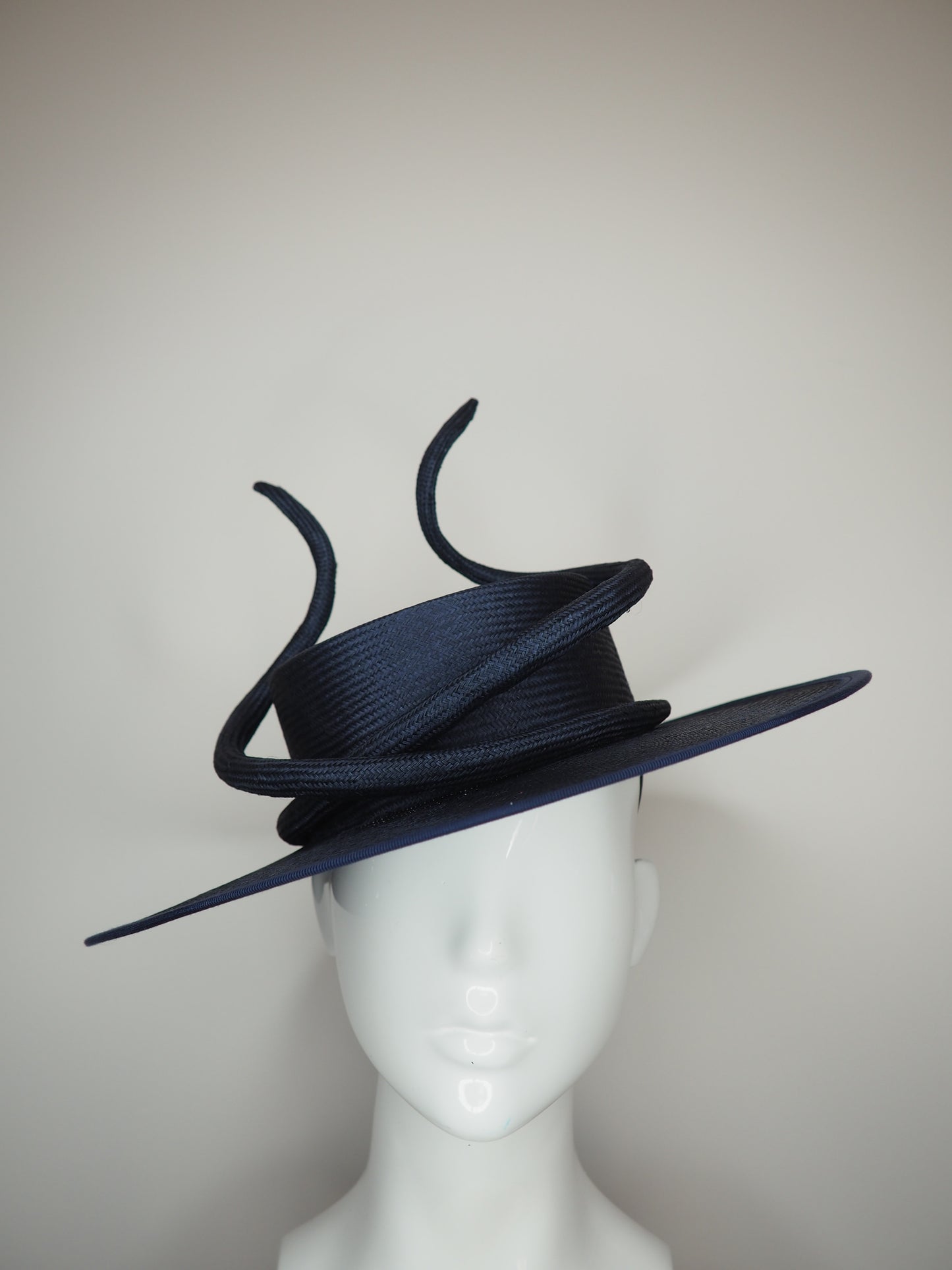 Navy baby - Navy boater with a sculpted parisisal swirl feature