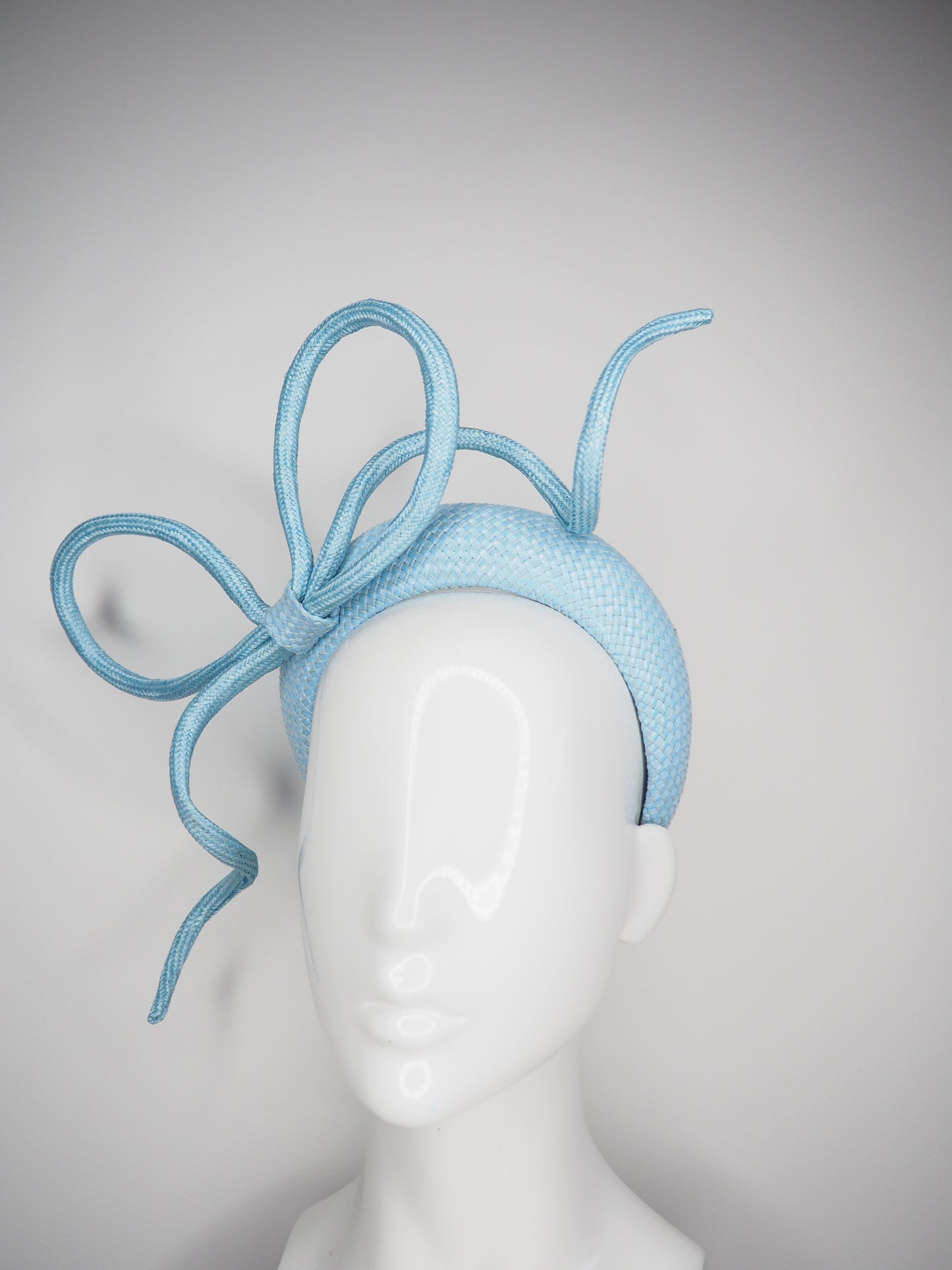 Blowing in the breeze - Baby Blue Straw Rope bow on raffia base