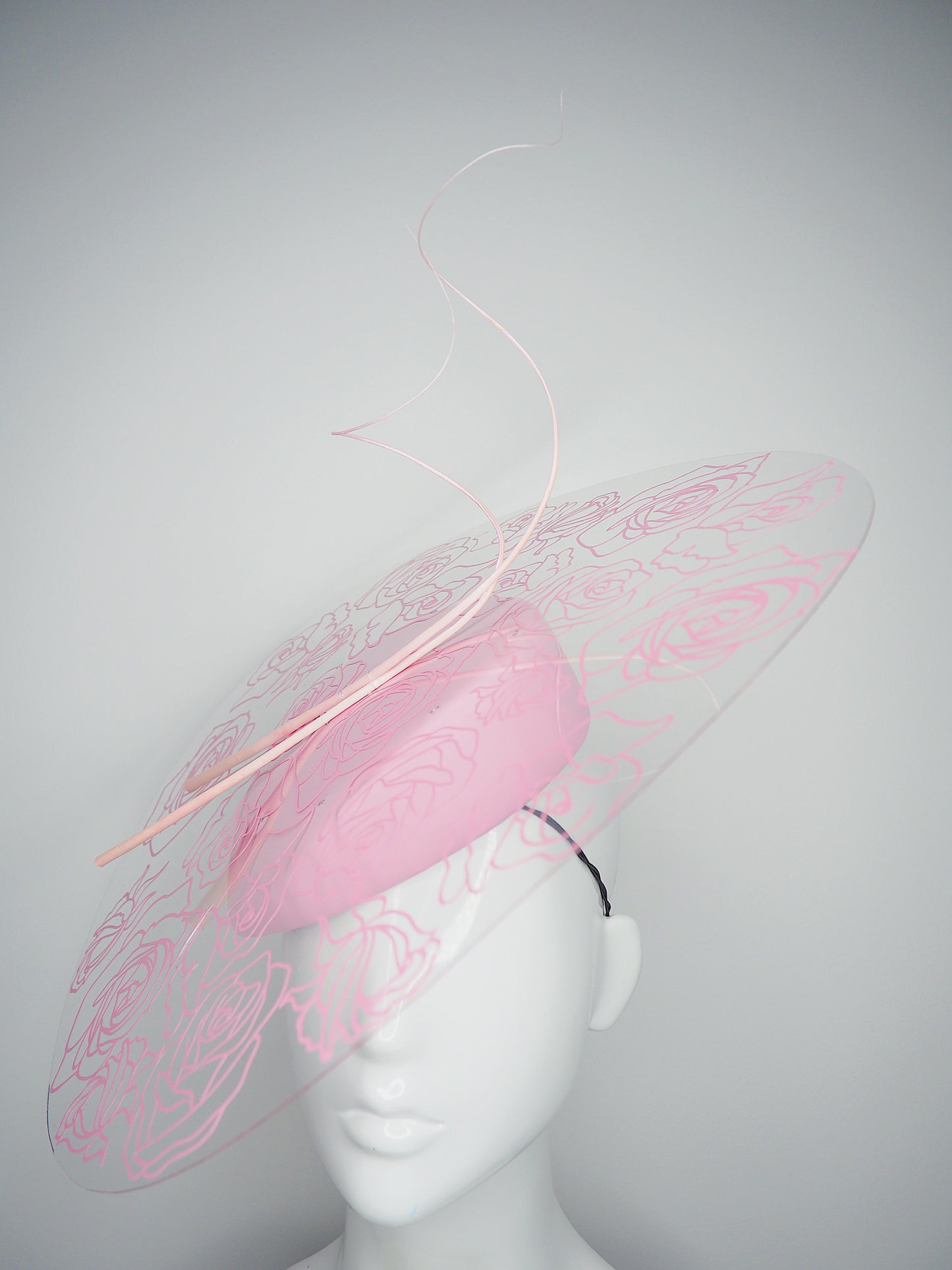 La Vie En Rose - Transparent Crystoform floral patterned brim on a pastel pink leather teardrop base.