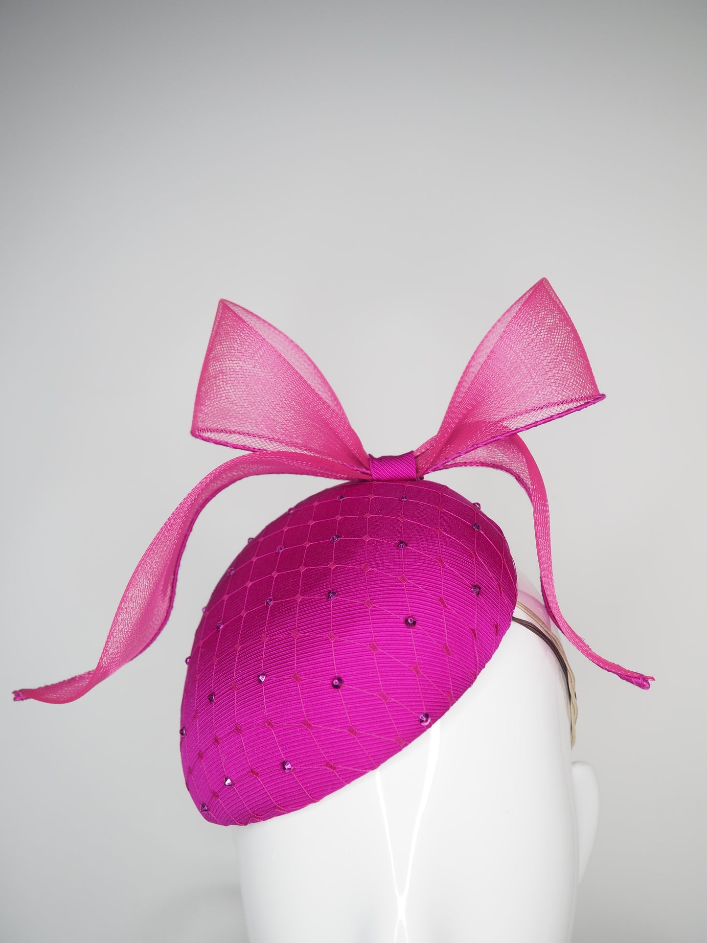 Windswept Miss Magenta - Magenta fabric petite tear drop beret with embellished veiling detail and windswept crinoline