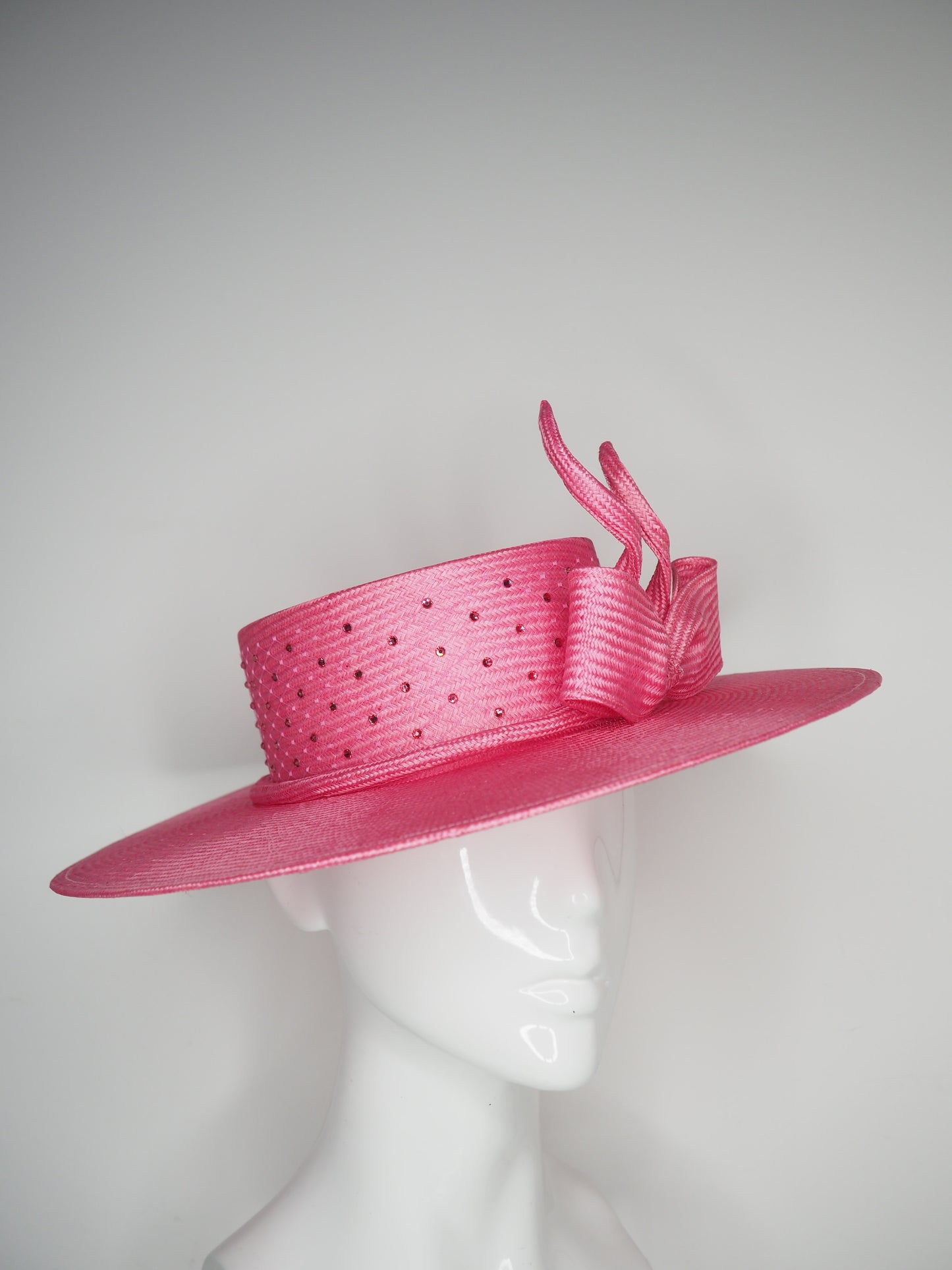 Petal Pink - Pink coloured hand dyed straw boater with sculpted wired bow and diamanté veil detail