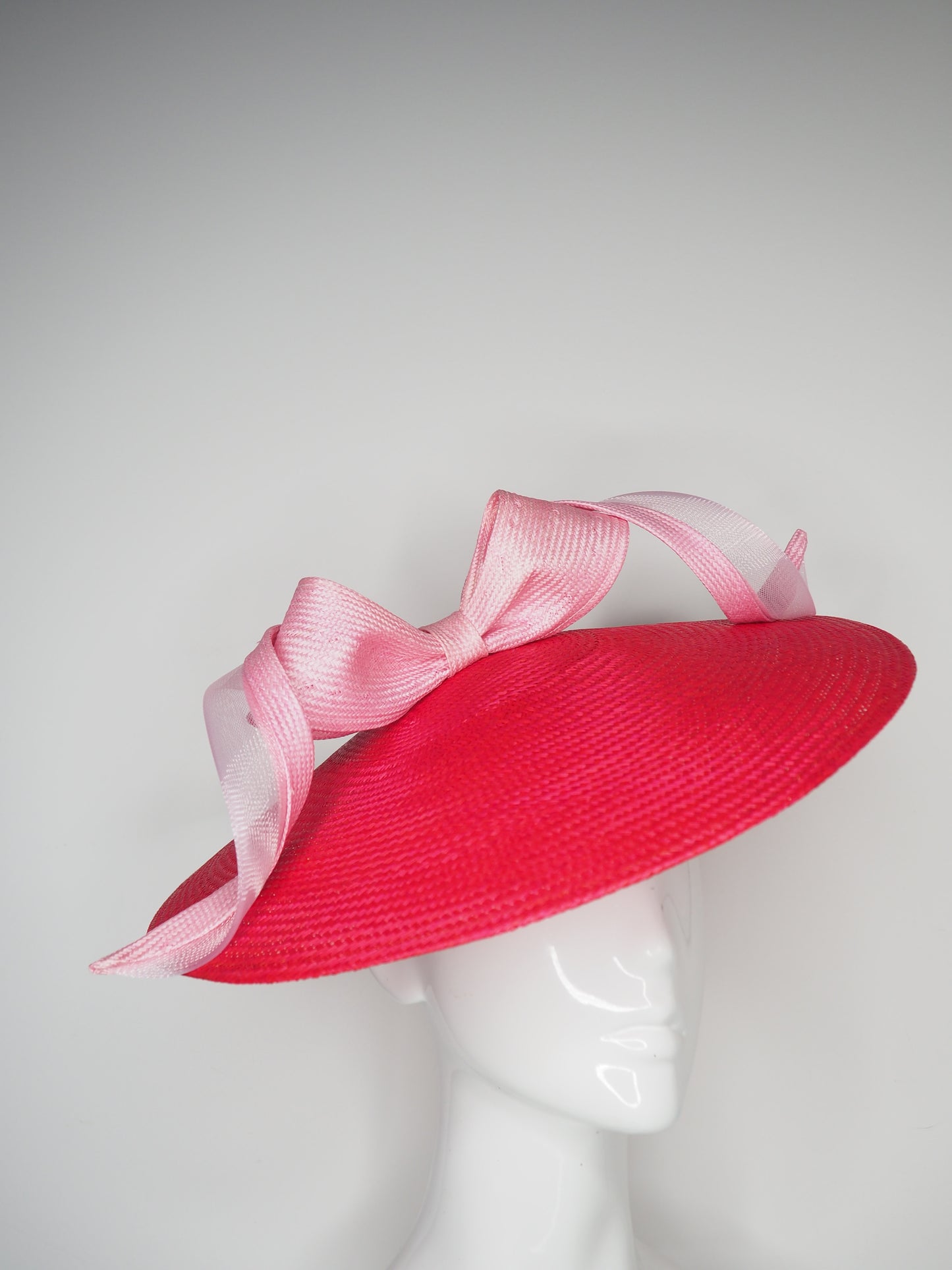Beautiful Bow - Baby Pink crinoline edged Bow on a raspberry red coolie buntal base