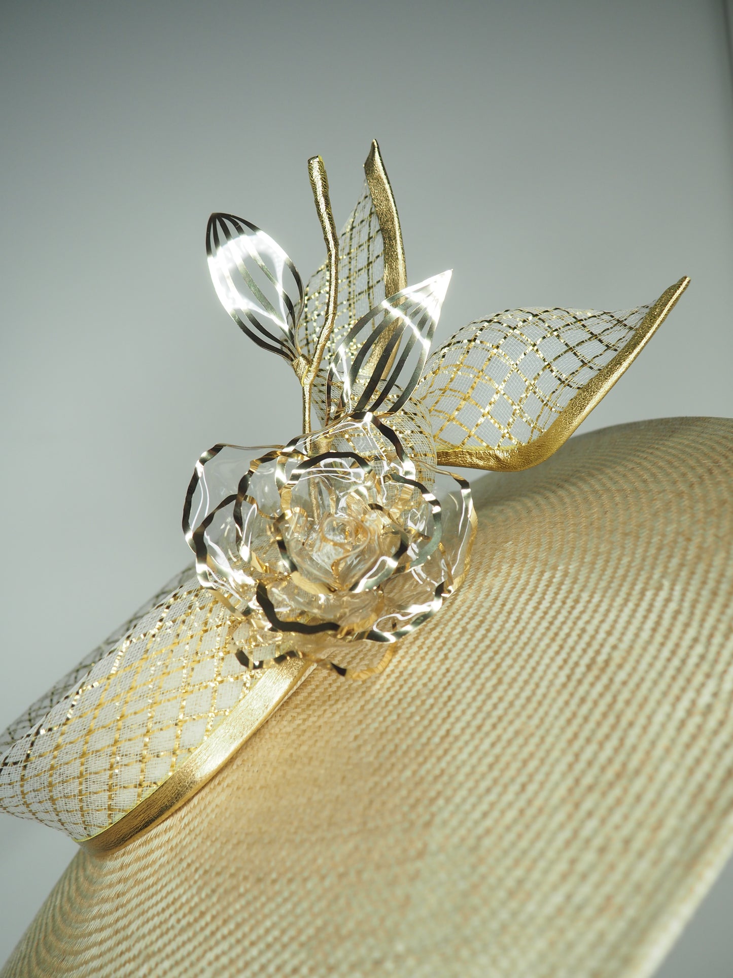 Golden Glimmer - Natural straw slanted brim boater with gold crystoform rose and crinoline trim.
