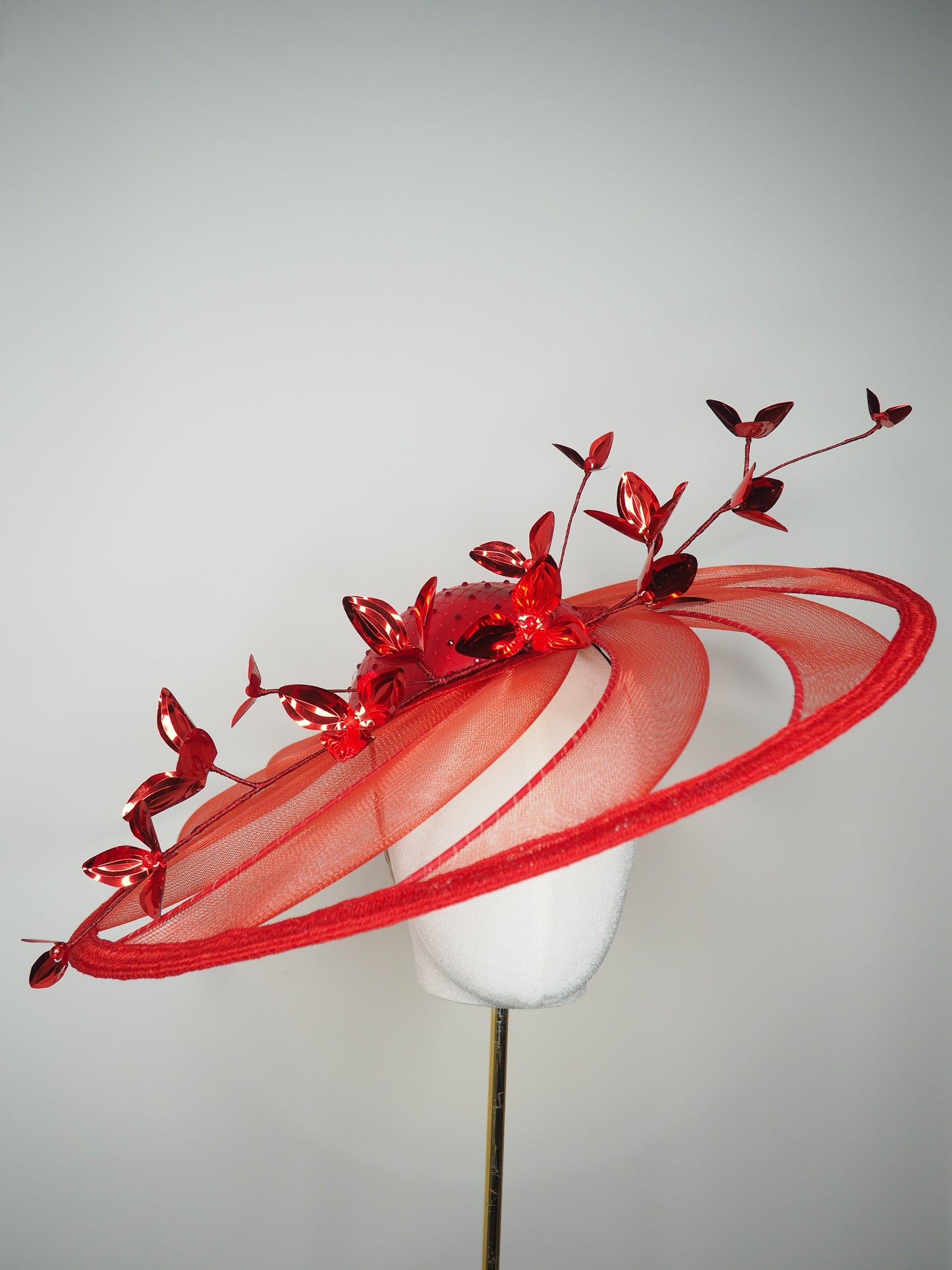 Scarlet Symphony - Wired crinoline swirl extra wide brim with leather base, diamante detail, and metallic red blossoms