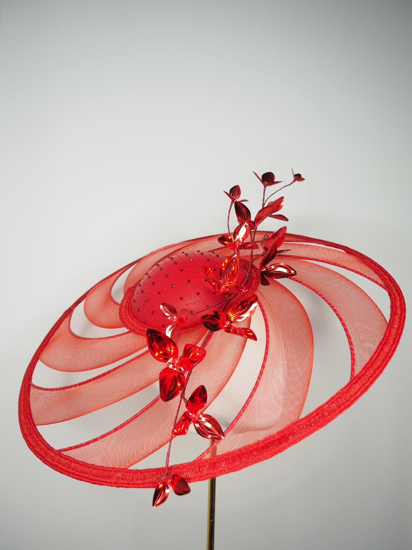 Scarlet Symphony - Wired crinoline swirl extra wide brim with leather base, diamante detail, and metallic red blossoms