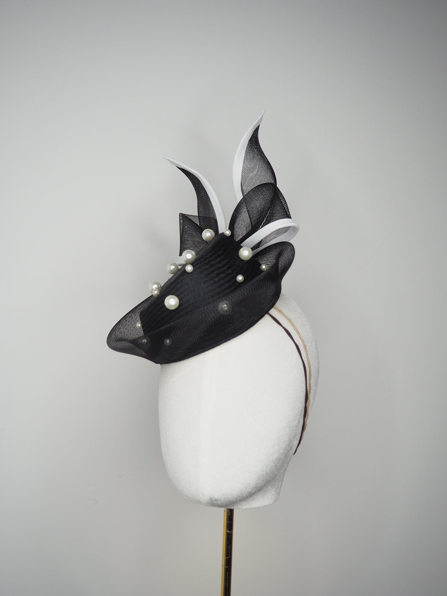 Back Tie pearl - Black asymmetric straw pillbox with wired crinoline bow in black and white and a scattering of pearls