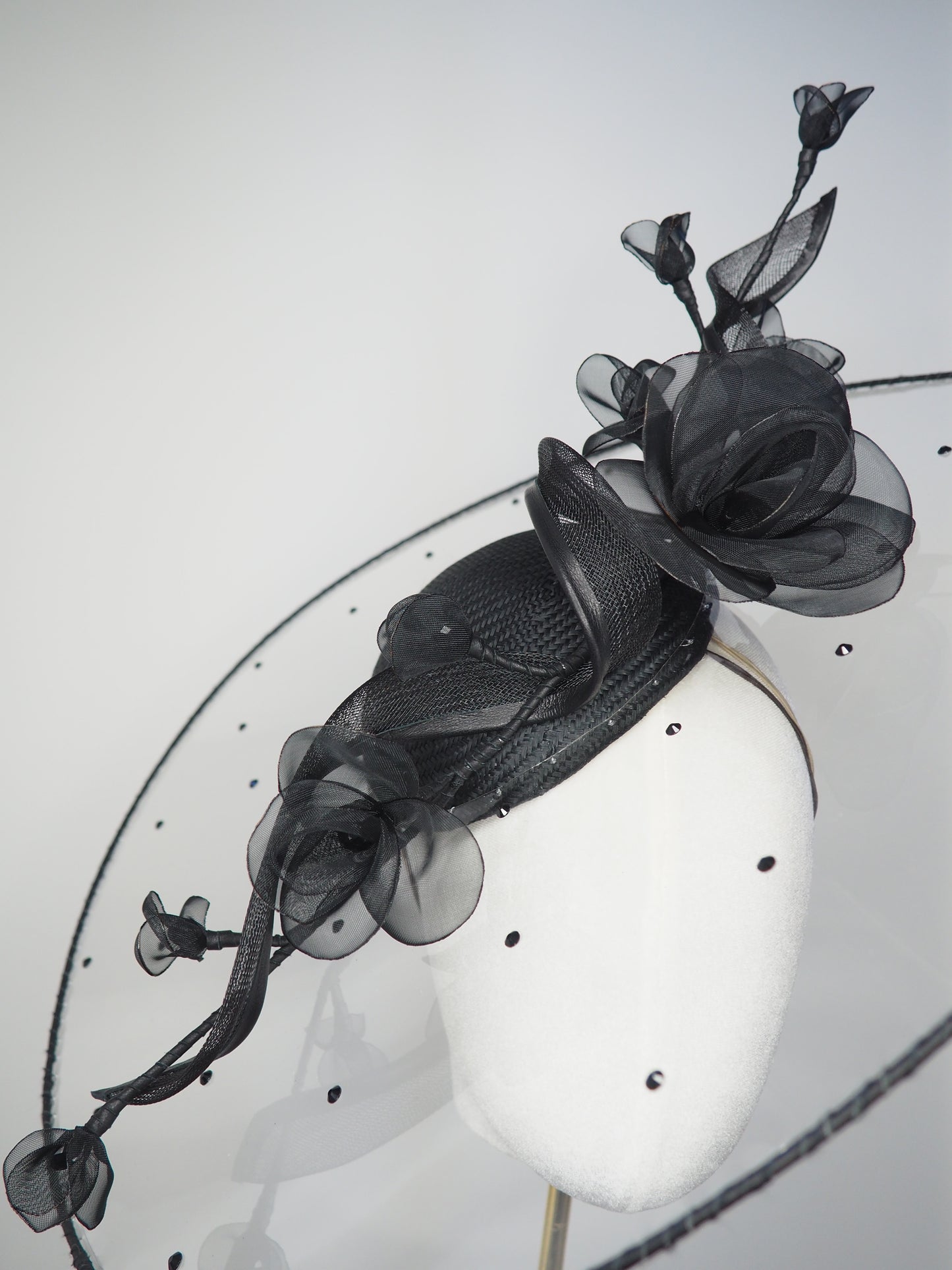 A Rainy Day in Melbourne - Black clear cristoform brim with wispy crinline roses & crinoline swirl