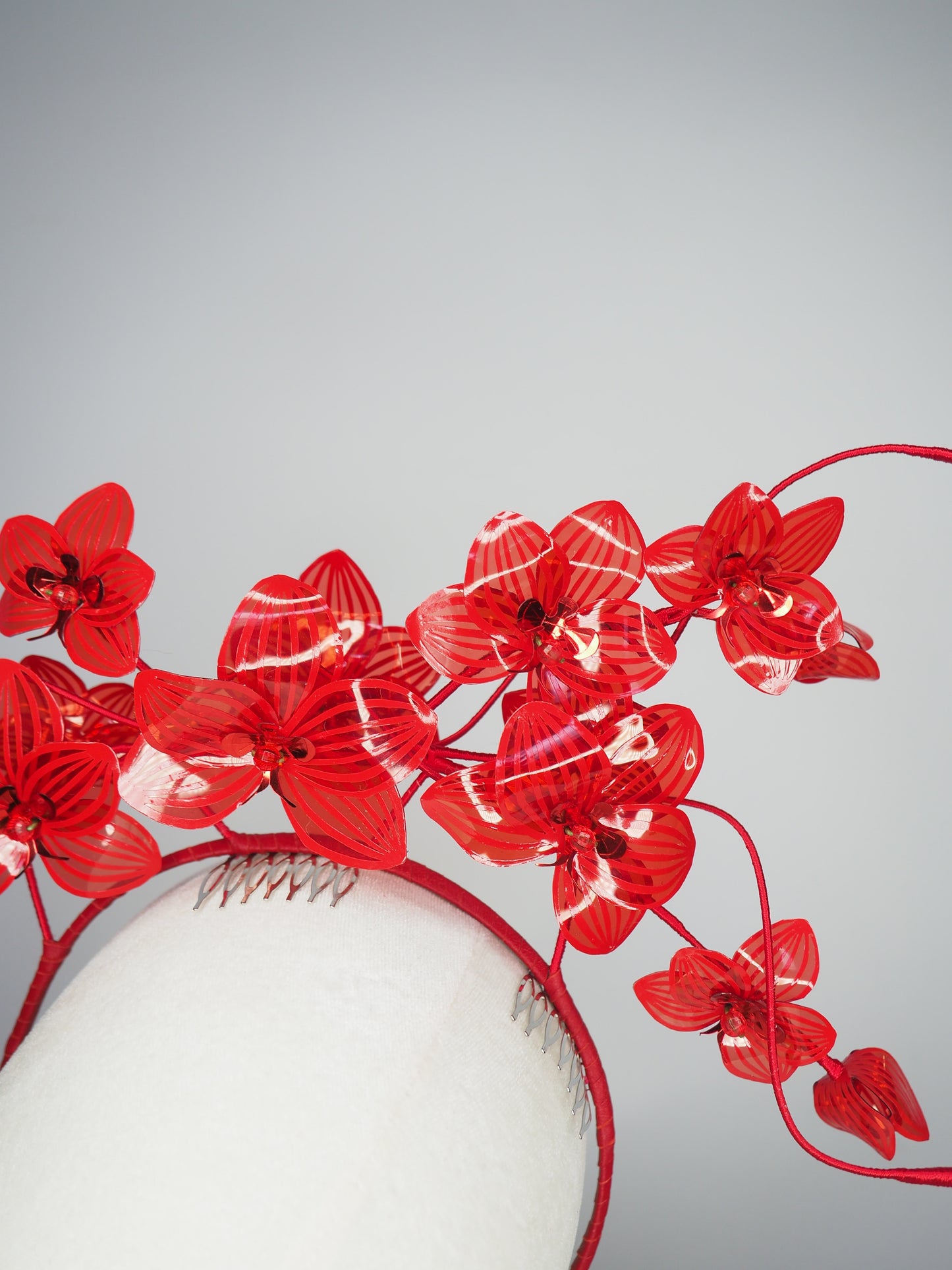 Scarlet Bloom -A dramatic floating orchid headband with sculptural wirework and handcrafted crimson blooms.