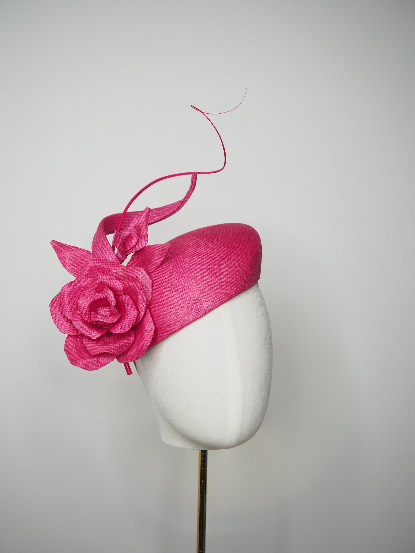 Rosé Reverie - Pink parasisal facehugger beret-style headpiece with sculpted straw rose and blossom and sculpted swirl
