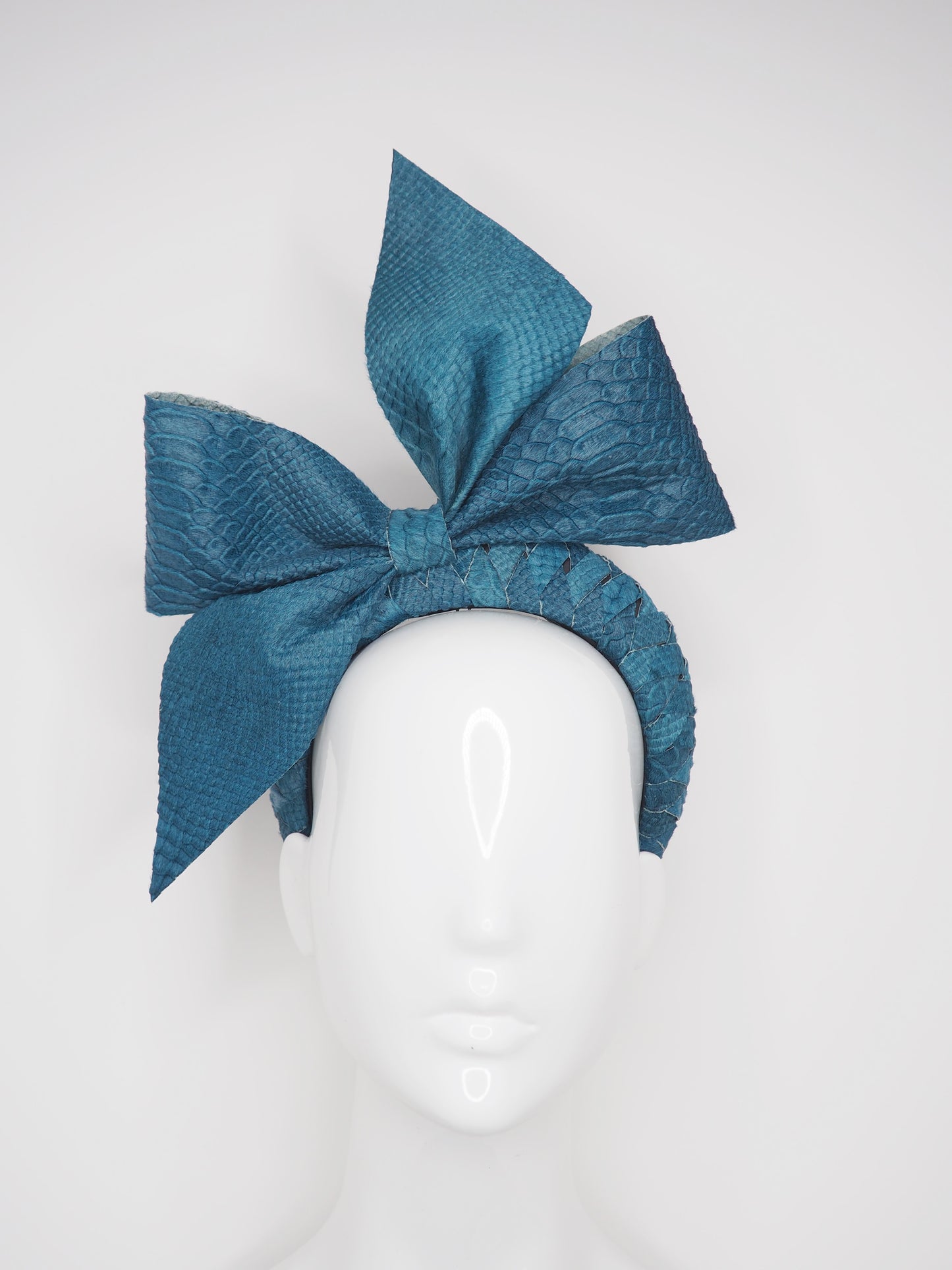 Teal Treat - Teal snake embossed Hair on Hide bow on braided 3d headband