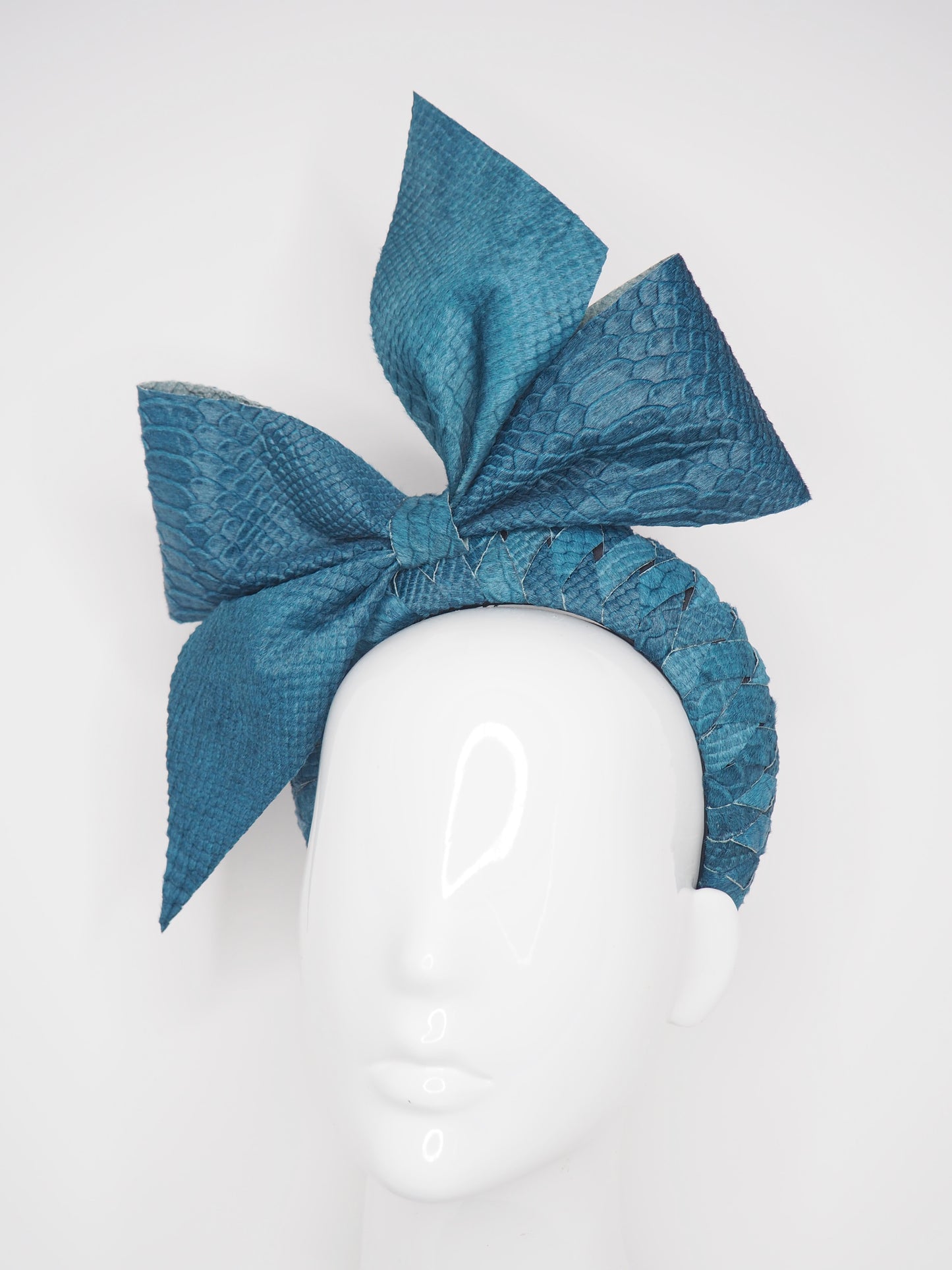 Teal Treat - Teal snake embossed Hair on Hide bow on braided 3d headband