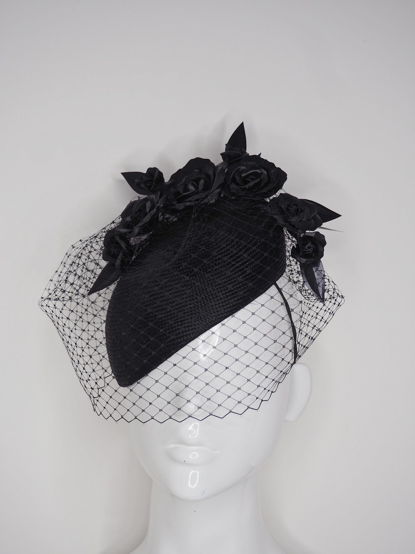 Black beauty - Facehugger base with parisisal straw and veil & leather rose detail