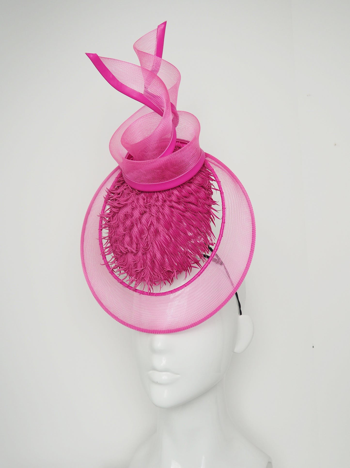 Tilt-a-whirl - Pink shredded patent leather percher with wired crinoline veil and swirl