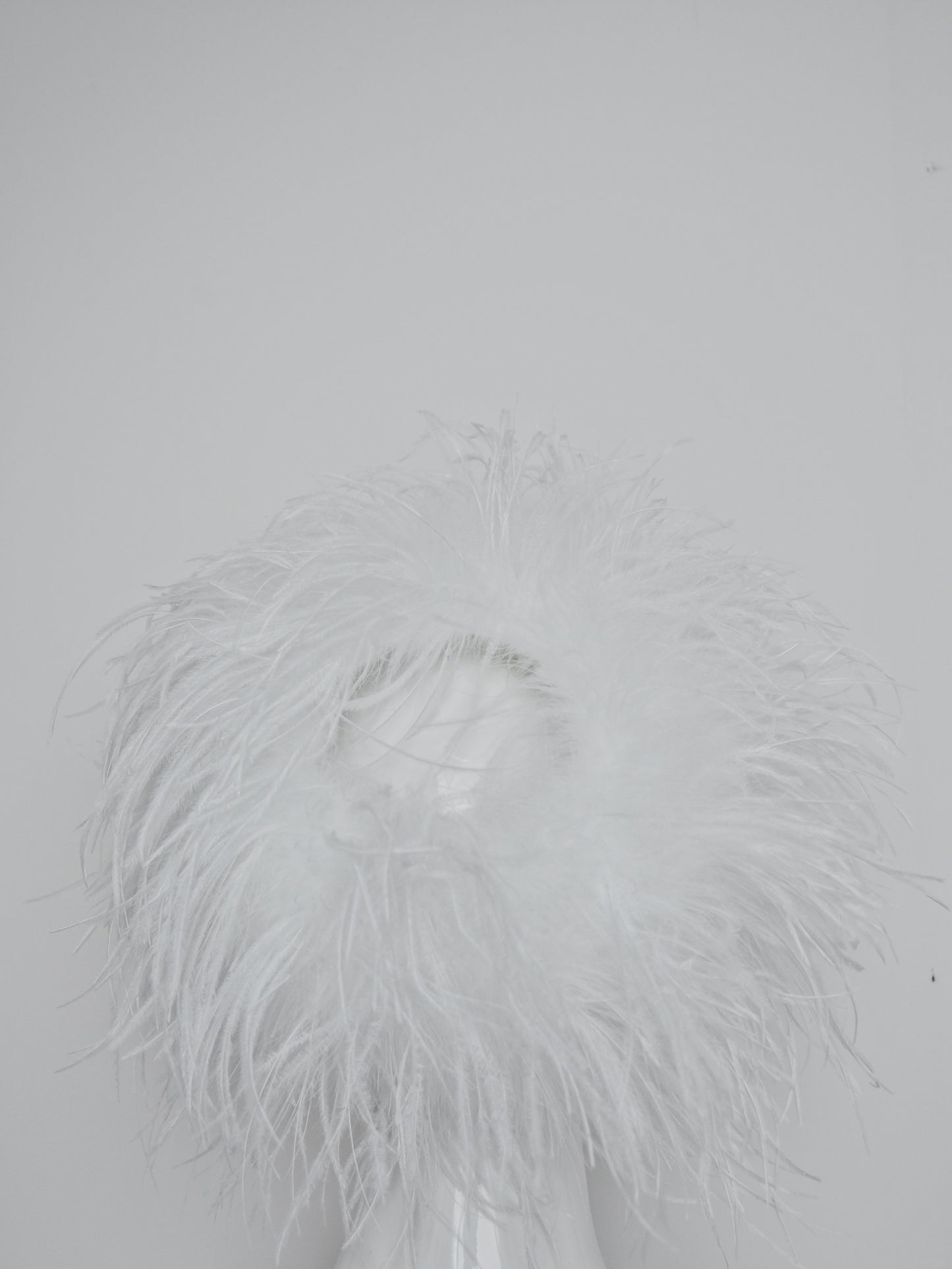 Winter Whisper - Ostrich covered Jackie O style pillbox with open top.