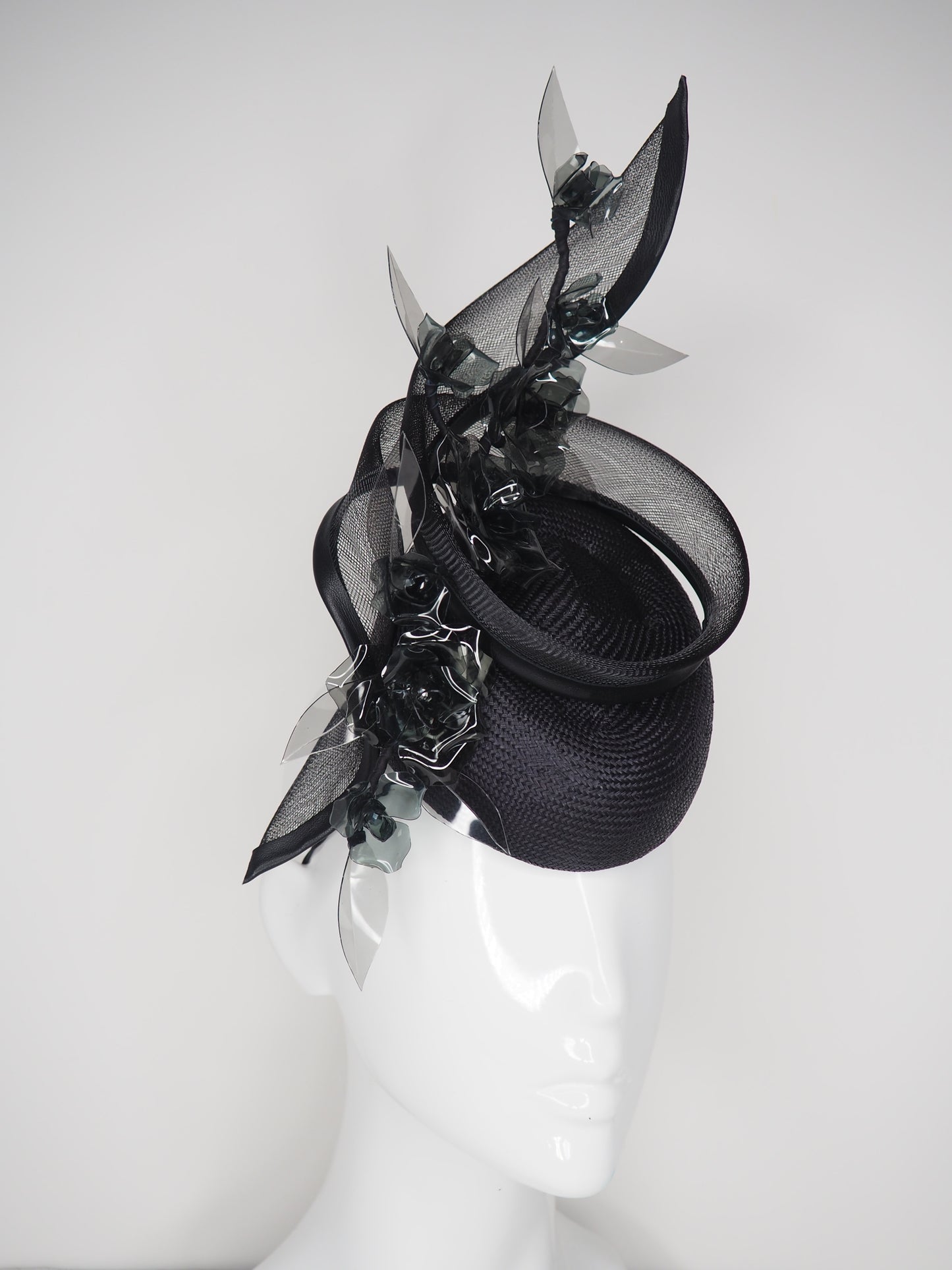 Whisper of smoke - Black Pork pie with crinoline Swirl an crystoform roses.
