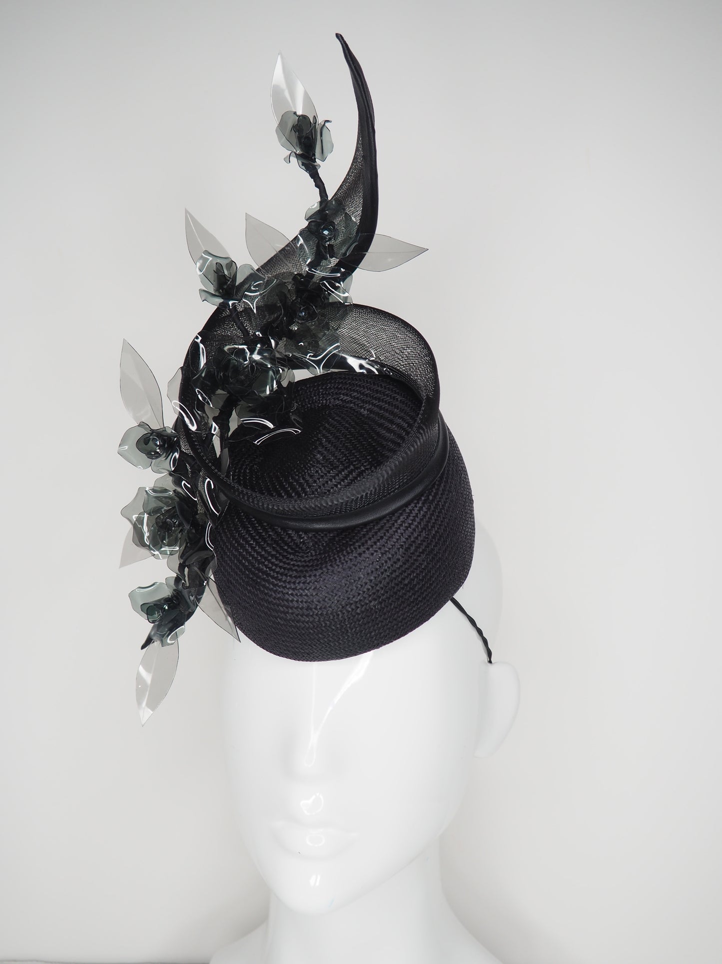 Whisper of smoke - Black Pork pie with crinoline Swirl an crystoform roses.